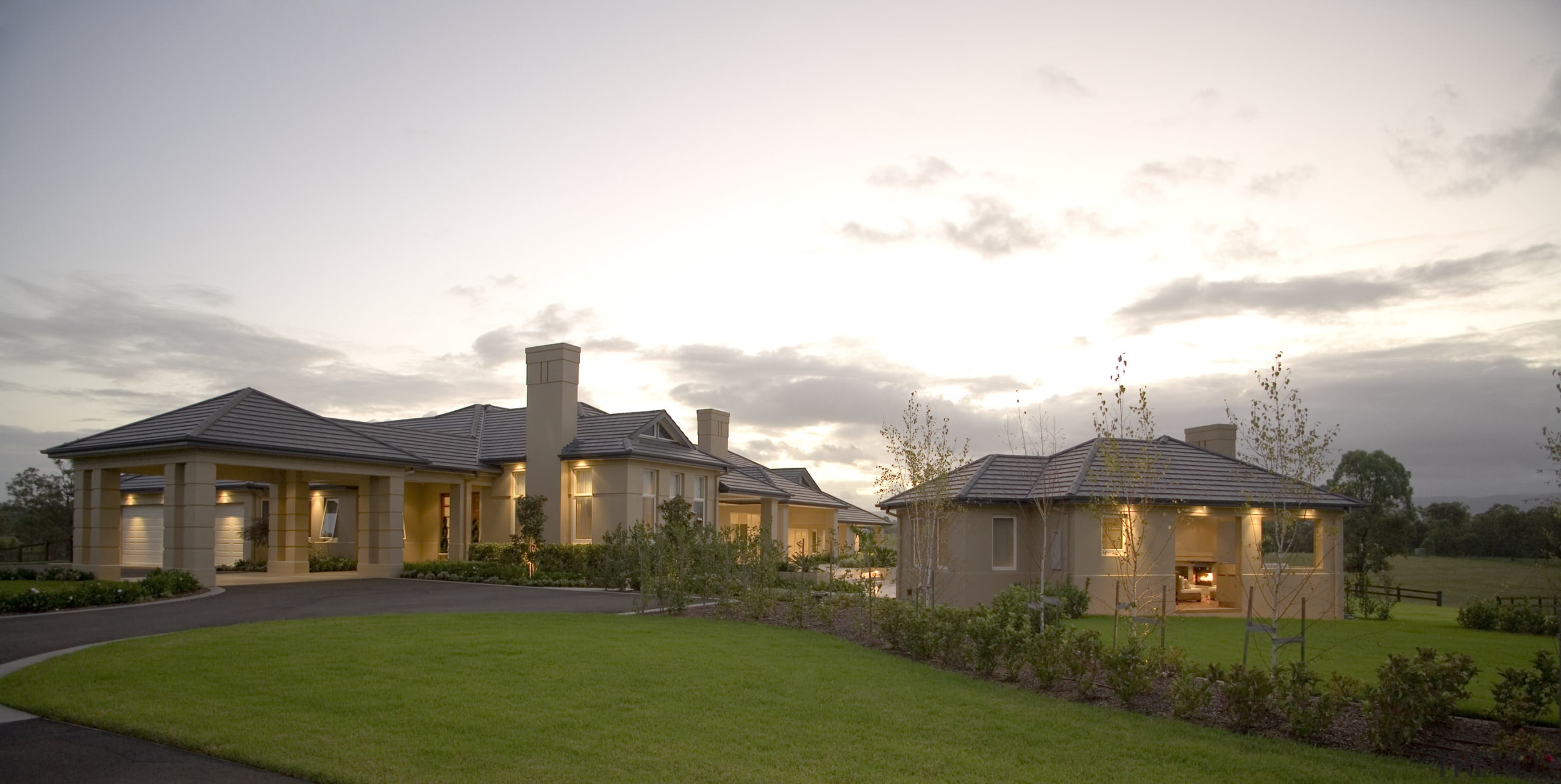 Exterior View of a home designed and Built cloud, cottage, estate, evening, facade, farmhouse, grass, home, house, landscape, mansion, morning, property, real estate, residential area, roof, sky, suburb, sunlight, white, brown