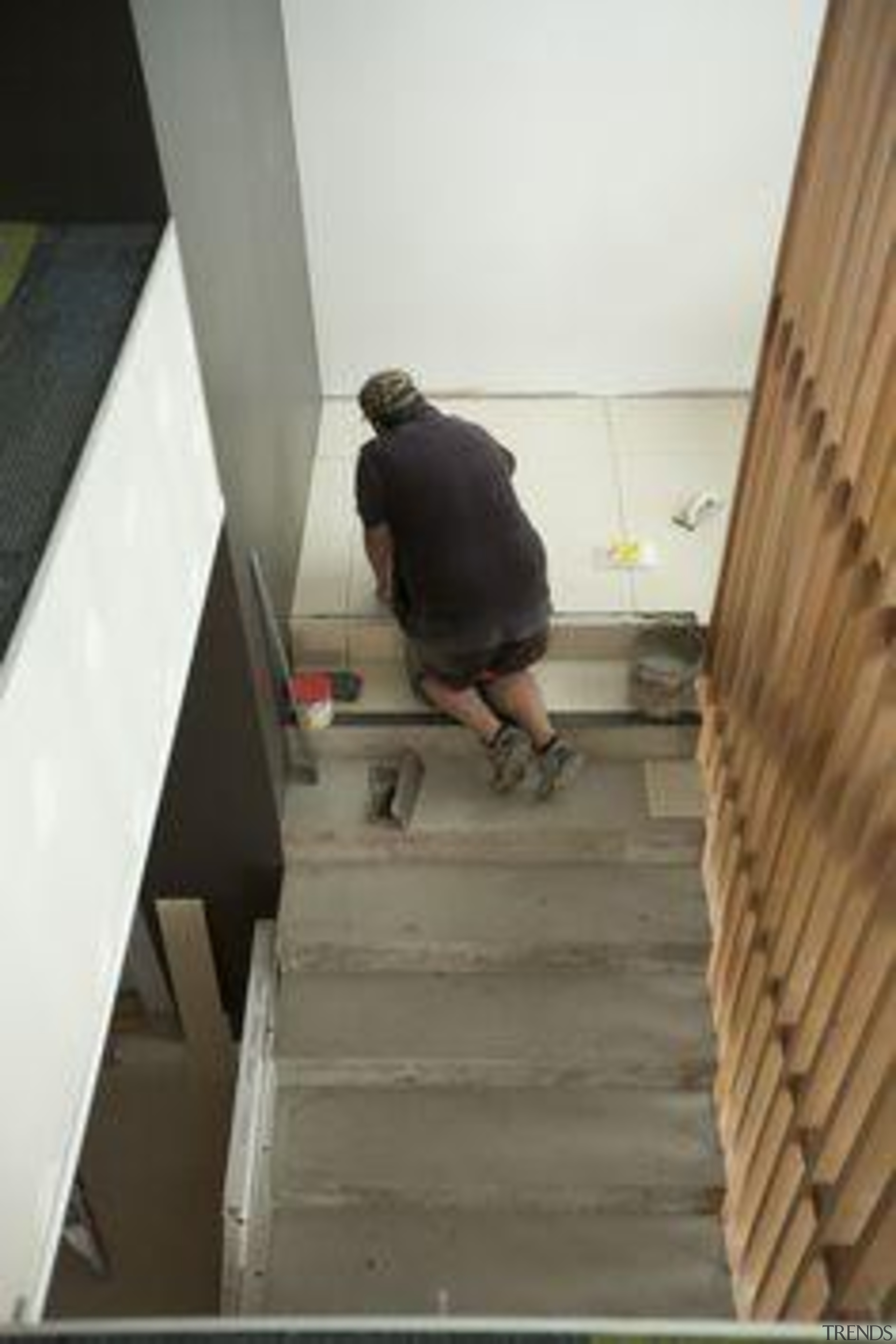 Installation of Naturali travertino avorio on floors. floor, flooring, hardwood, stairs, wood, wood flooring, wood stain, white, gray