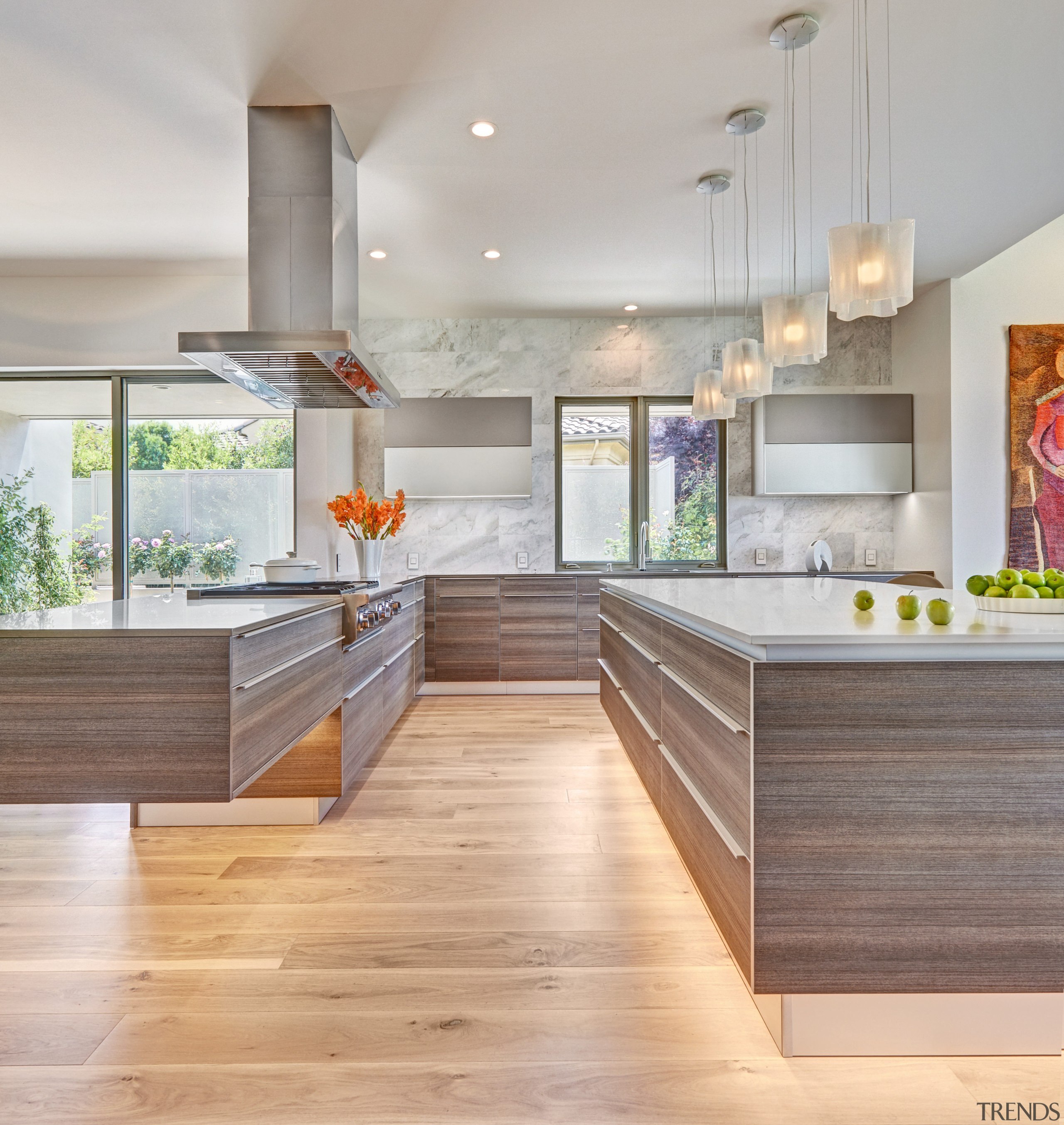 The dramatic cantilever in this kitchen is highlighted cabinetry, countertop, cuisine classique, floor, flooring, hardwood, interior design, kitchen, laminate flooring, wood flooring, gray
