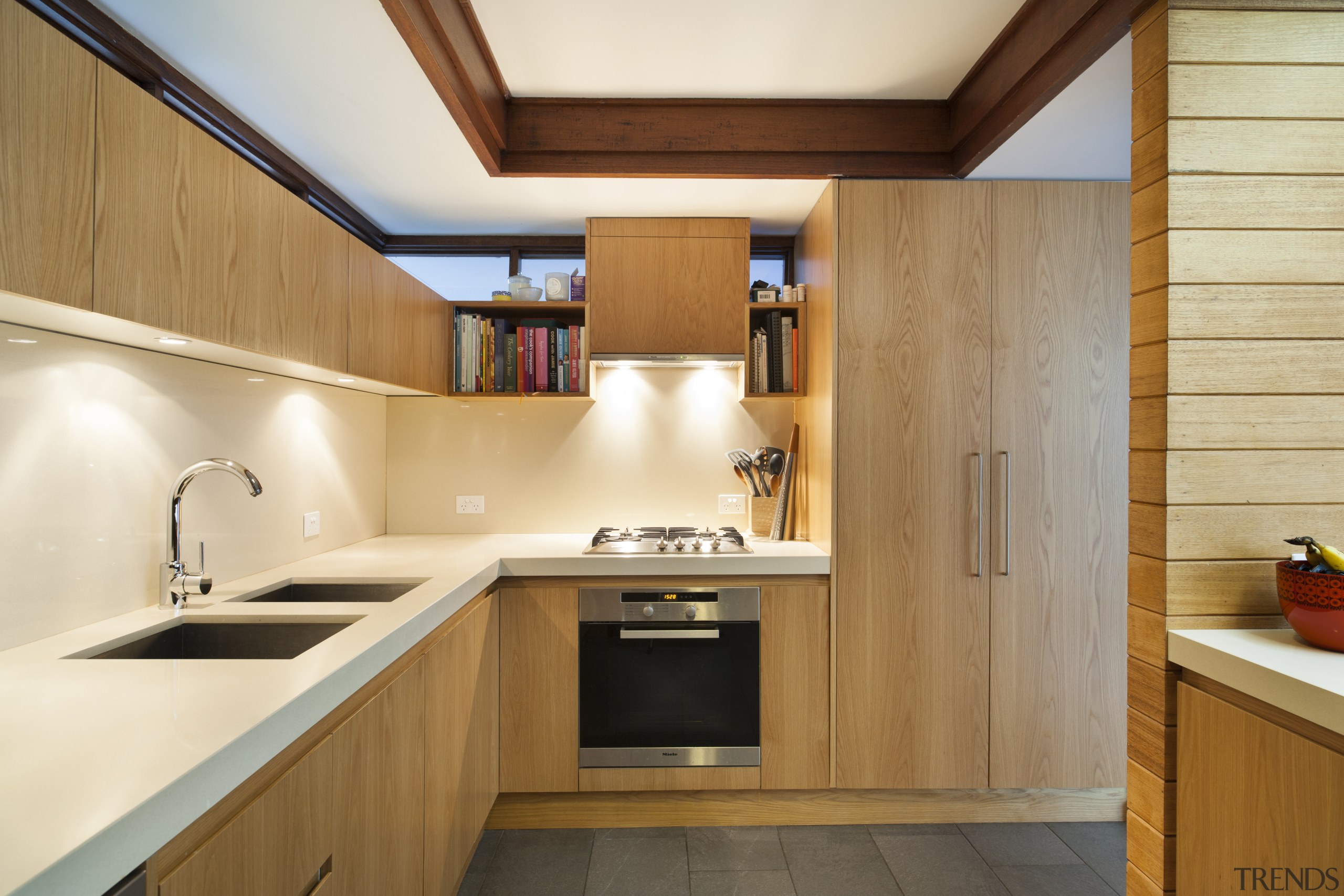 As part of the revamp of this Mid-century architecture, cabinetry, countertop, cuisine classique, interior design, kitchen, real estate, room, wood, orange, brown