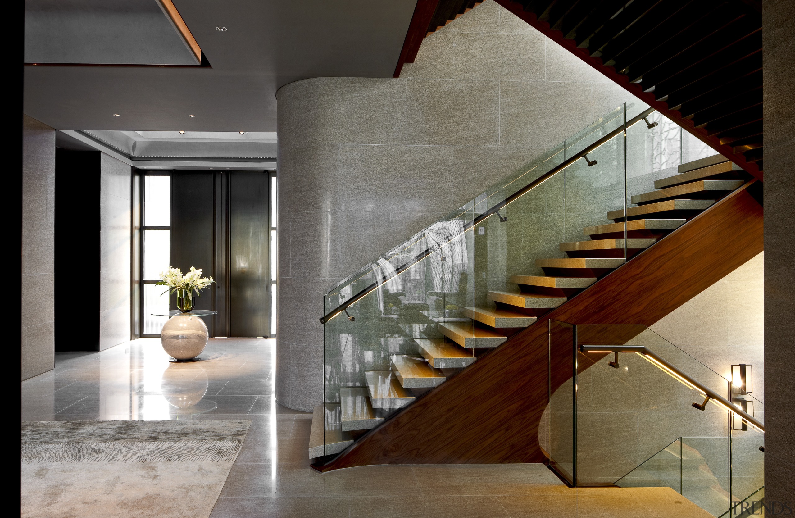 View of stairway in a contemporary home. - architecture, handrail, interior design, lobby, stairs, gray