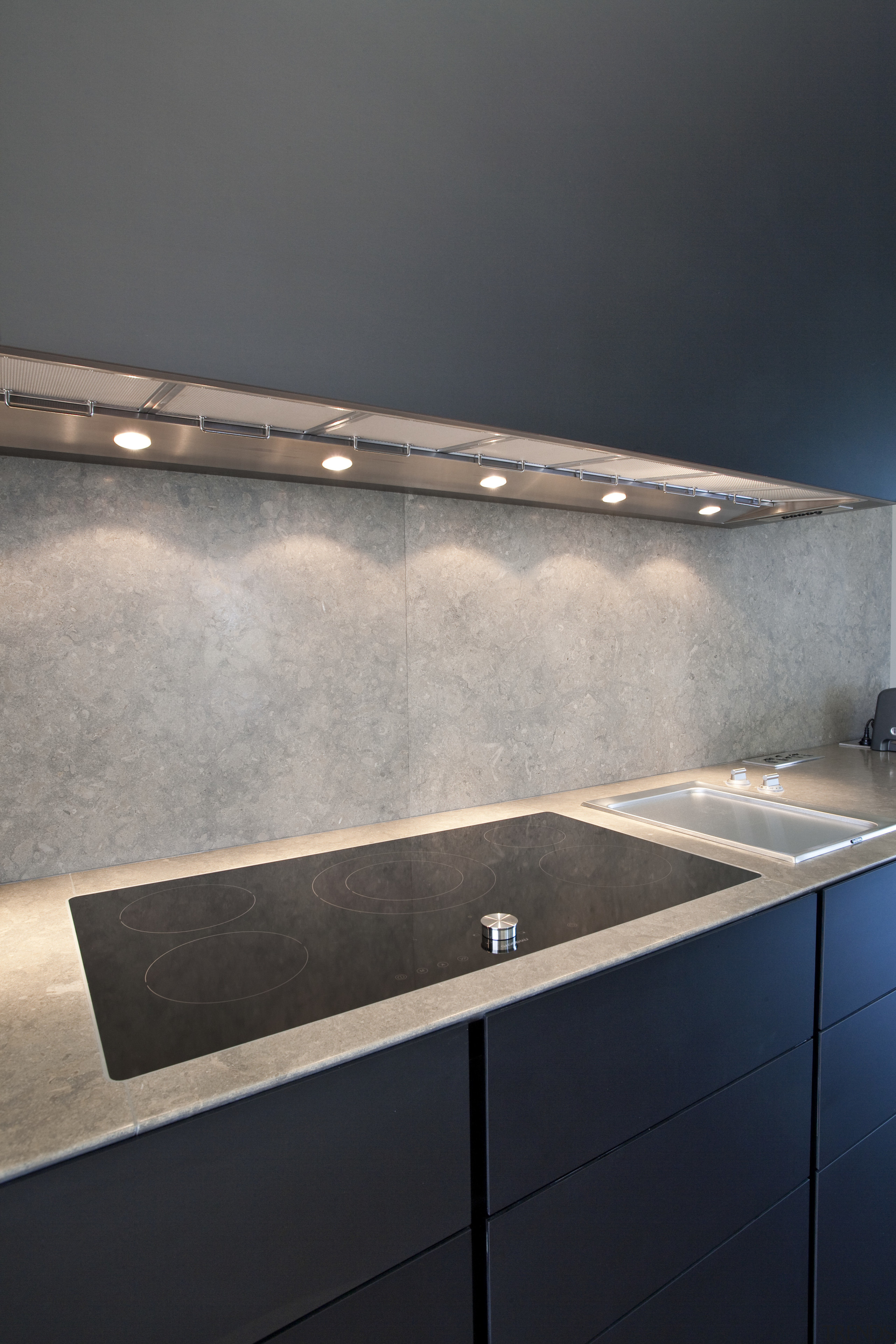 View of a contemporary kitchen which features island, architecture, countertop, daylighting, floor, light, sink, tile, wall, gray, black