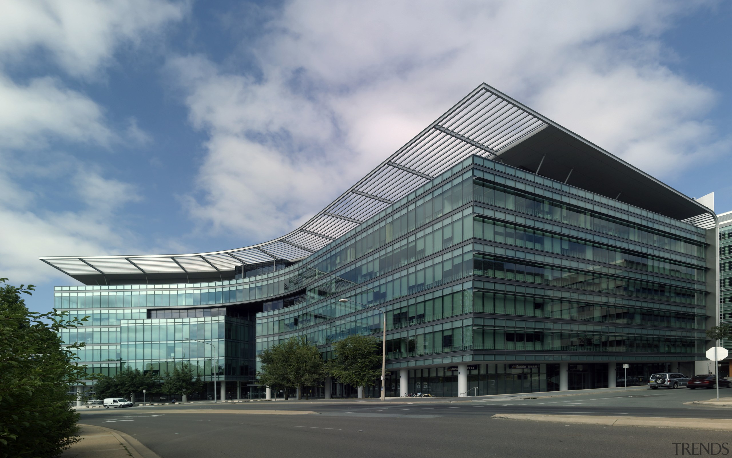 View of 7 London Circuit in Canberra. Leighton architecture, building, commercial building, condominium, convention center, corporate headquarters, daytime, facade, headquarters, metropolis, metropolitan area, mixed use, sky, skyscraper, tower block, gray, teal