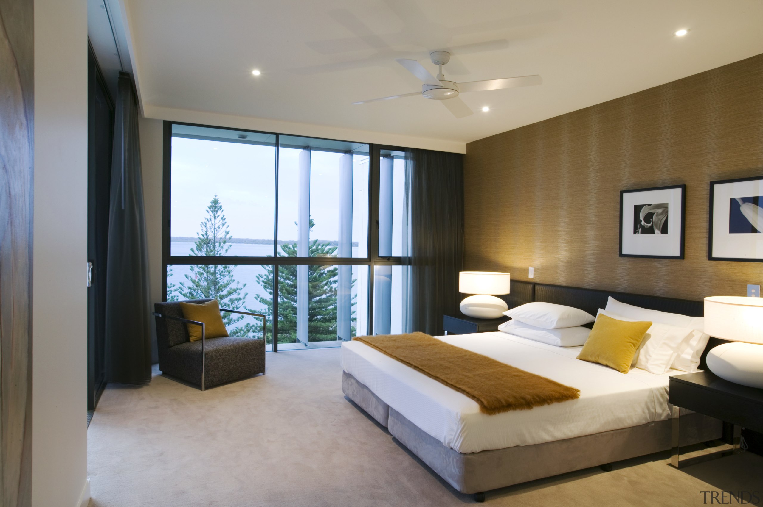 A view of the master bedroom featuring carpet bedroom, ceiling, hotel, interior design, real estate, room, suite, gray