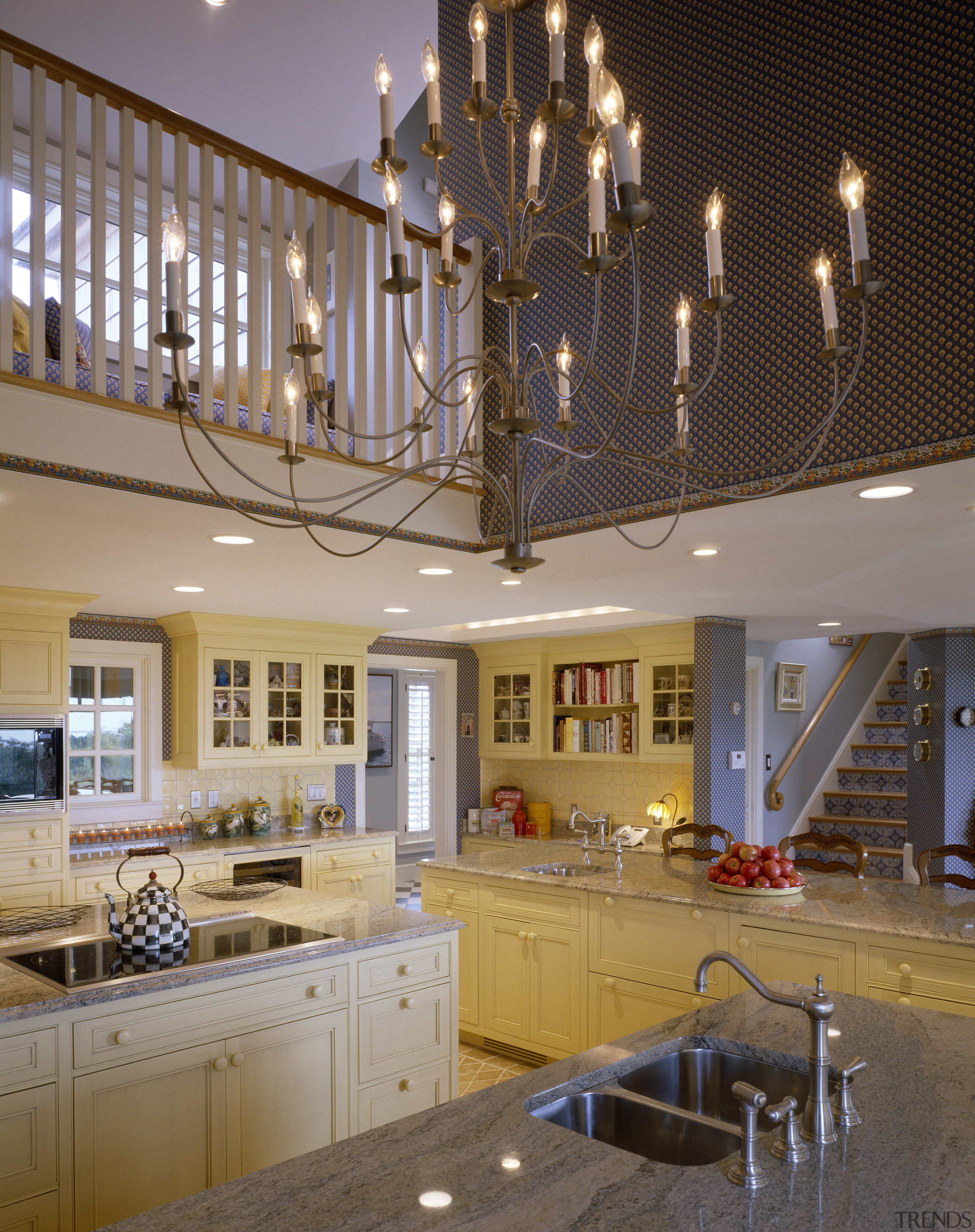 View of kitchen area which features a chandelier ceiling, countertop, daylighting, home, interior design, kitchen, lighting, room, brown, gray