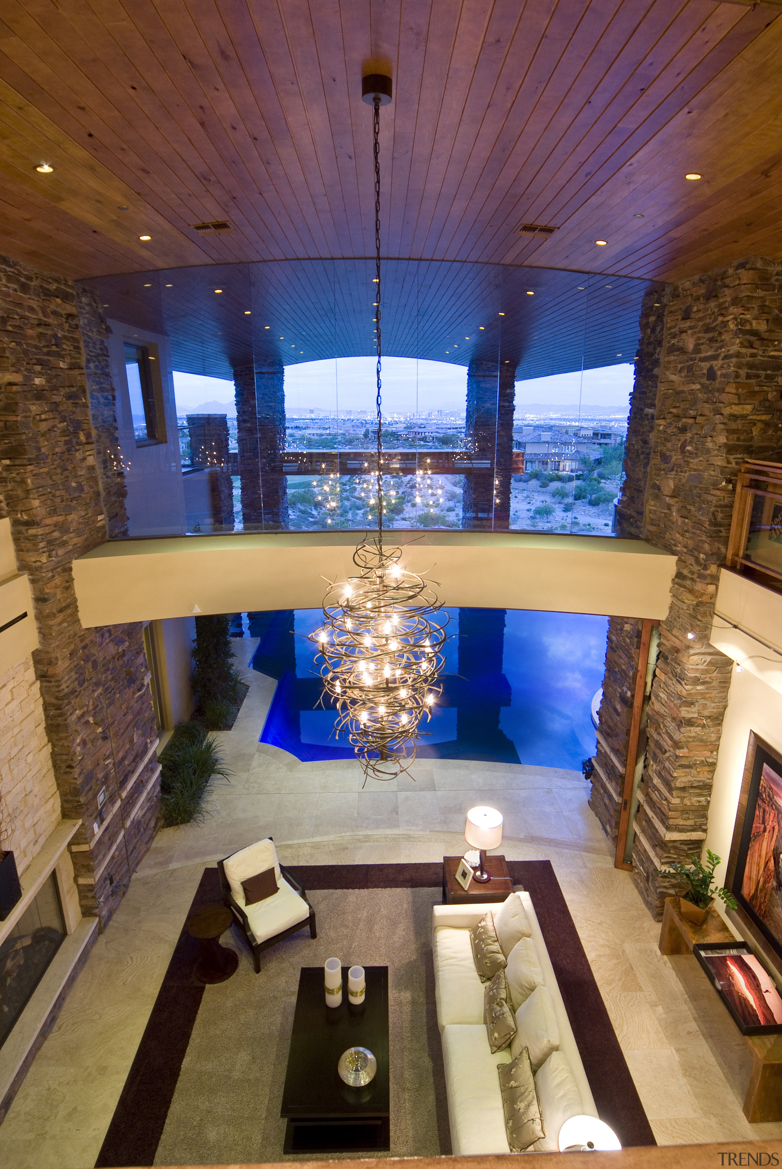 View of the living area which features a architecture, ceiling, estate, home, house, interior design, lighting, living room, lobby, room, brown