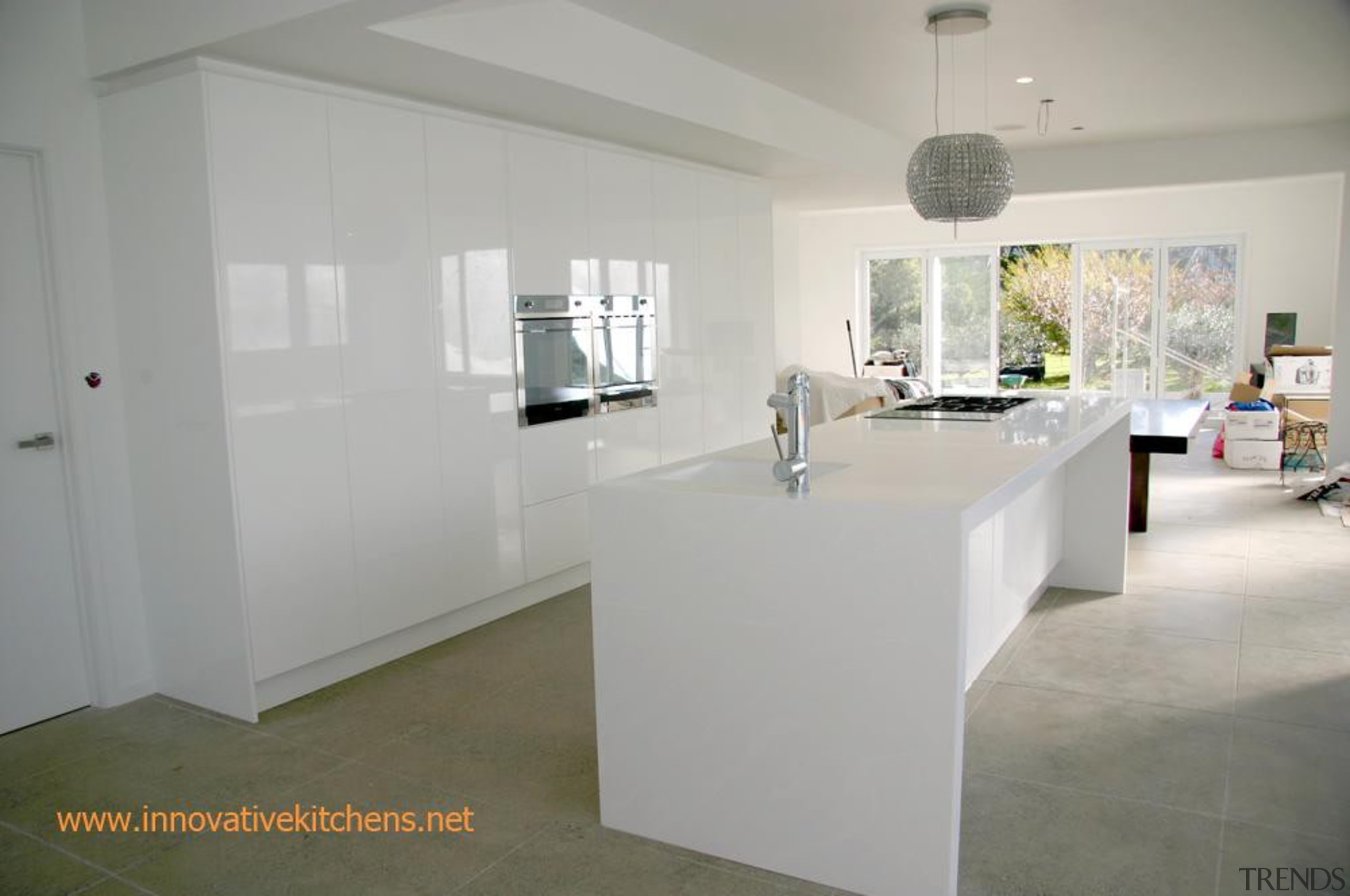 Corian benchtop in gloss white kitchen - Corian architecture, floor, flooring, furniture, home, interior design, property, real estate, table, gray