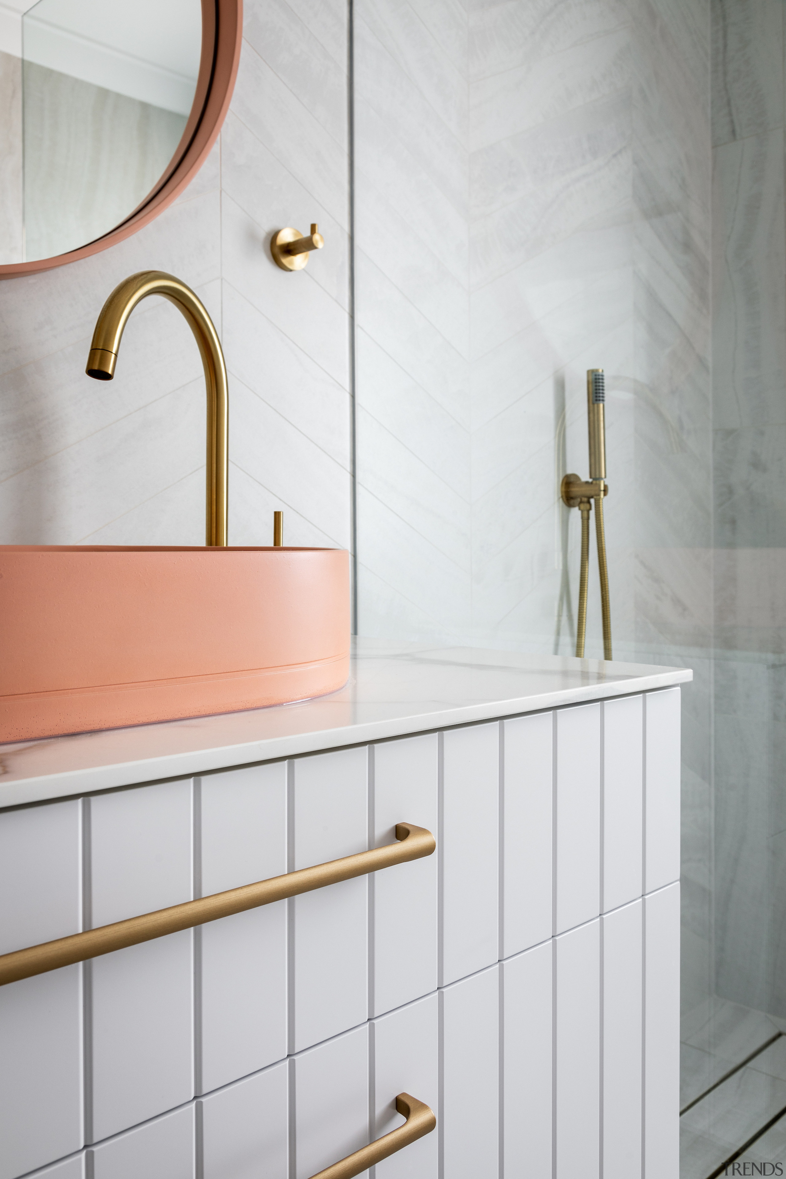 The concrete tabletop basins add a pink touch 