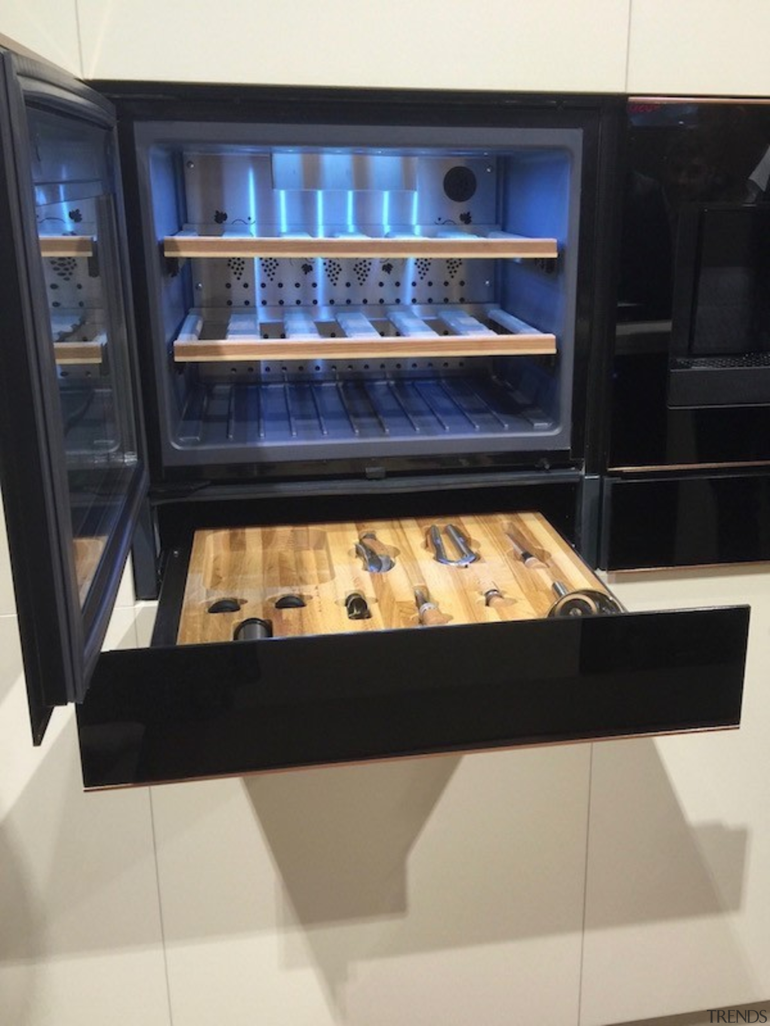 The new range of Smeg integrated wine cellars display case, home appliance, kitchen appliance, black, gray