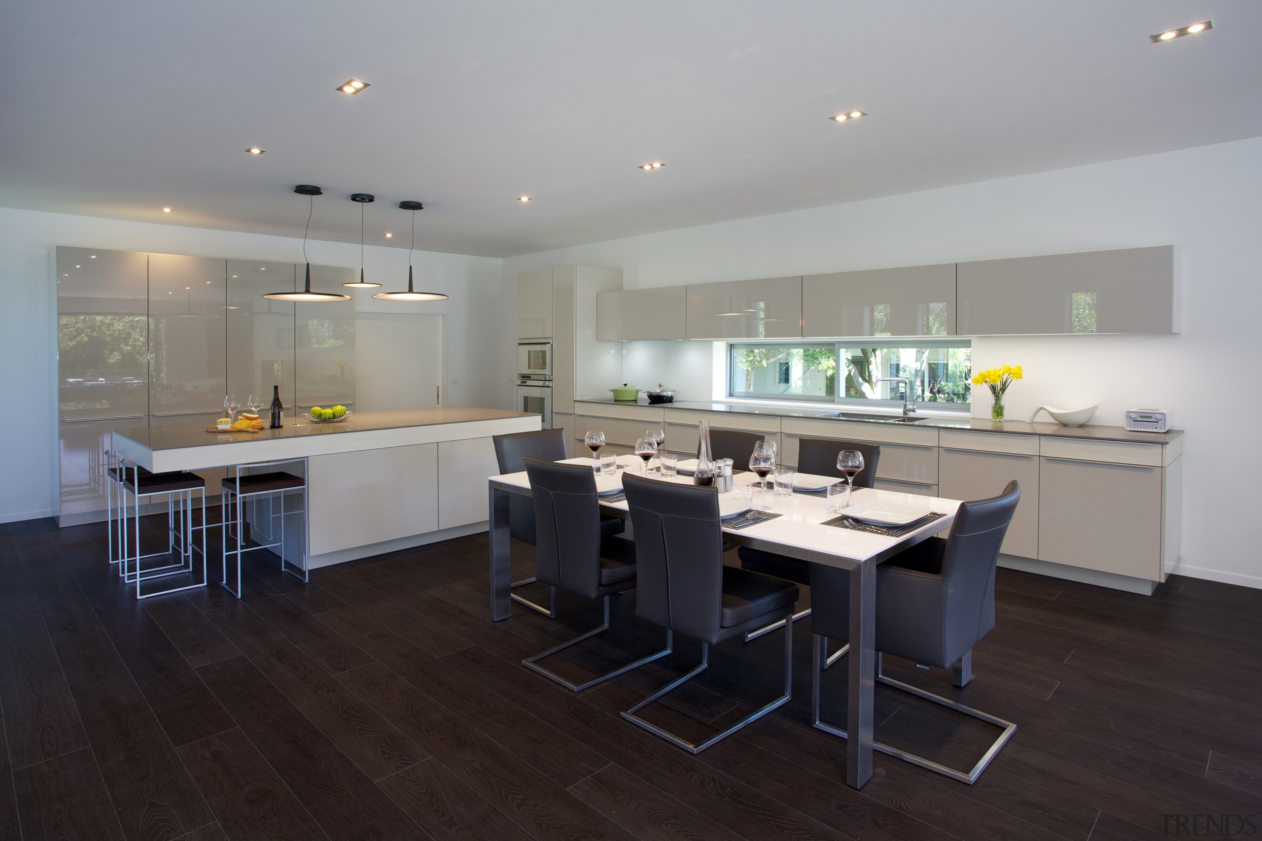 The sliding door in the end wall of countertop, interior design, kitchen, property, room, gray, black