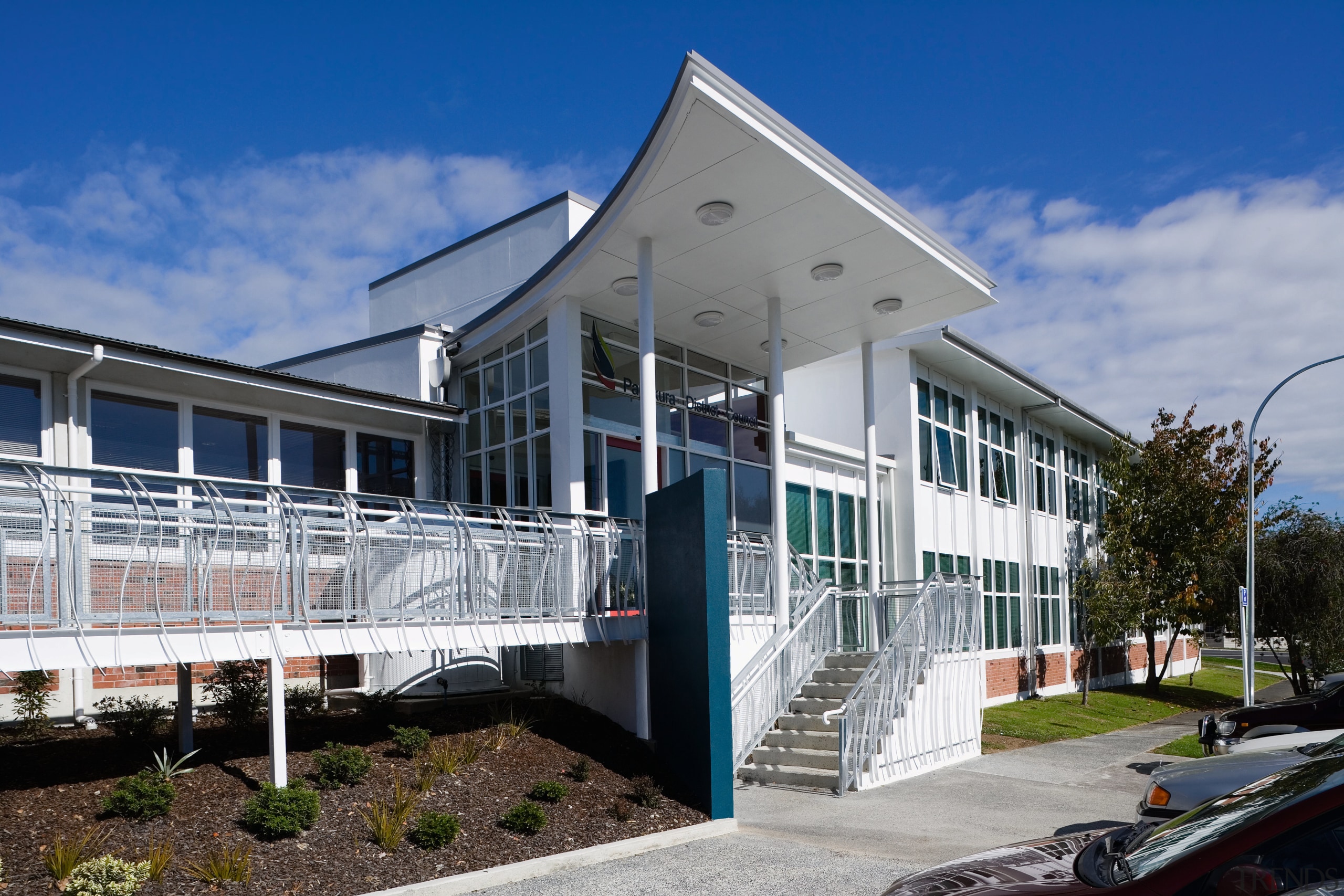 A view of the Papakura District Council's office architecture, building, corporate headquarters, facade, home, house, property, real estate, residential area, gray, blue