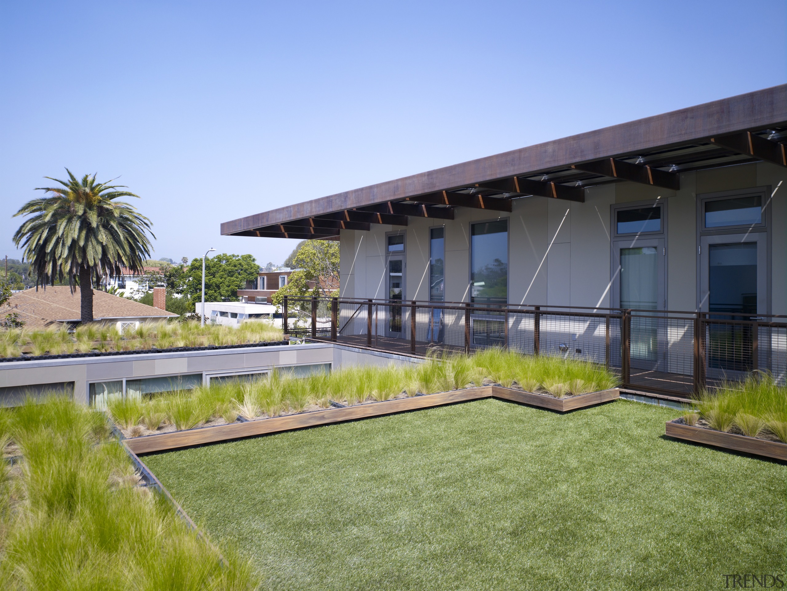 These rooftop gardens form part of the home's architecture, condominium, estate, grass, home, house, lawn, plant, property, real estate, roof, villa, water, teal