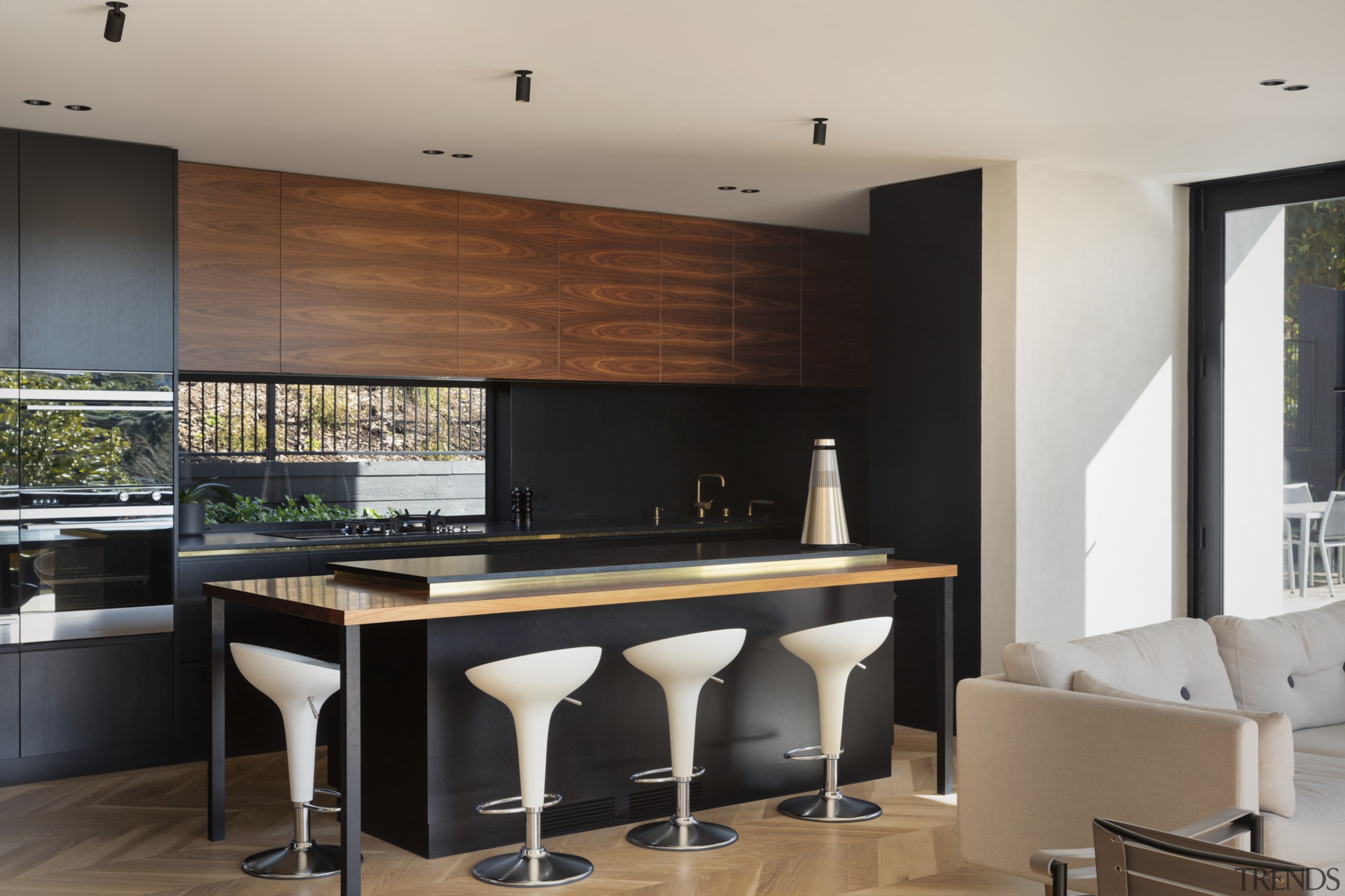 1970's home becomes a modern entertainer's dream - architecture, bar stool, building, cabinetry, ceiling, countertop, design, dining room, floor, flooring, furniture, glass, hardwood, home, house, interior design, kitchen, laminate flooring, living room, loft, property, real estate, room, stool, table, tile, wall, wood, wood flooring, gray, black