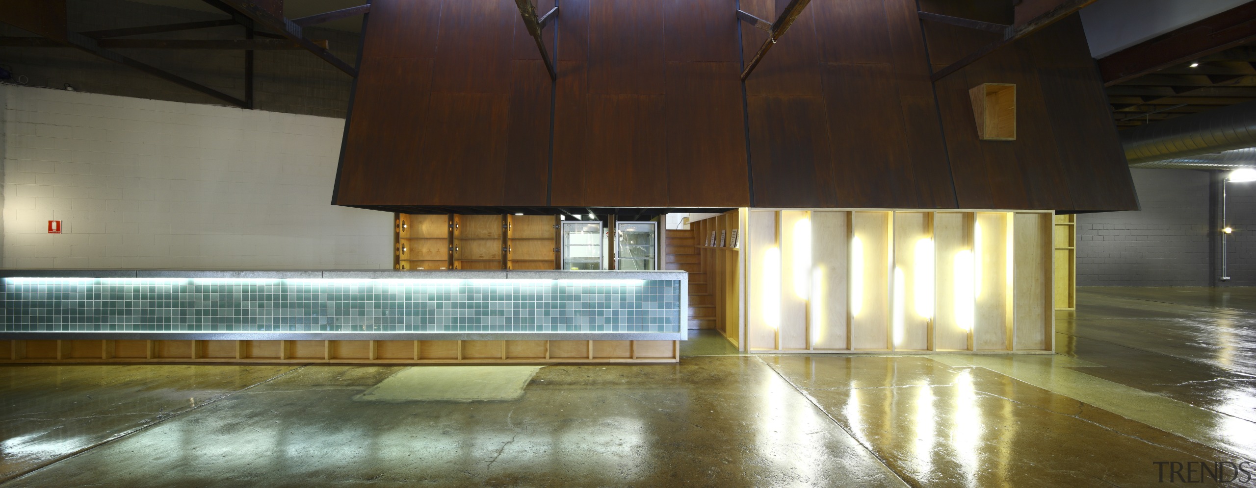 View of the bar on the lower level architecture, ceiling, daylighting, floor, flooring, interior design, light, lighting, lobby, wood, brown