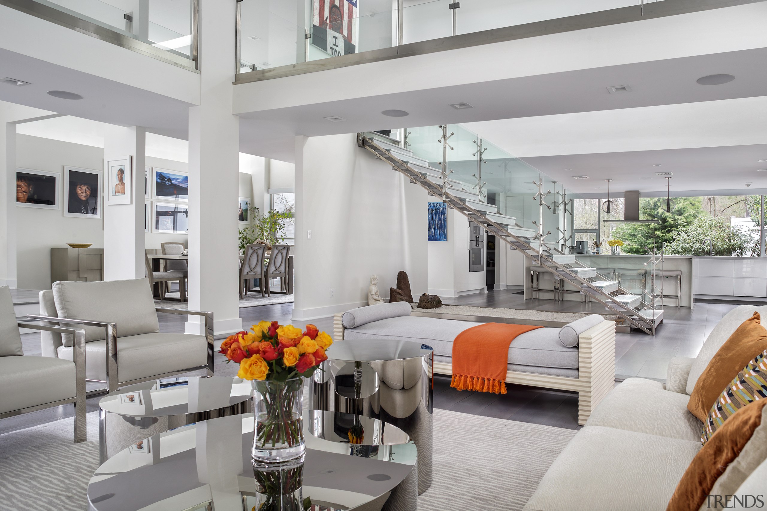 The central open staircase with glass balustrades is 