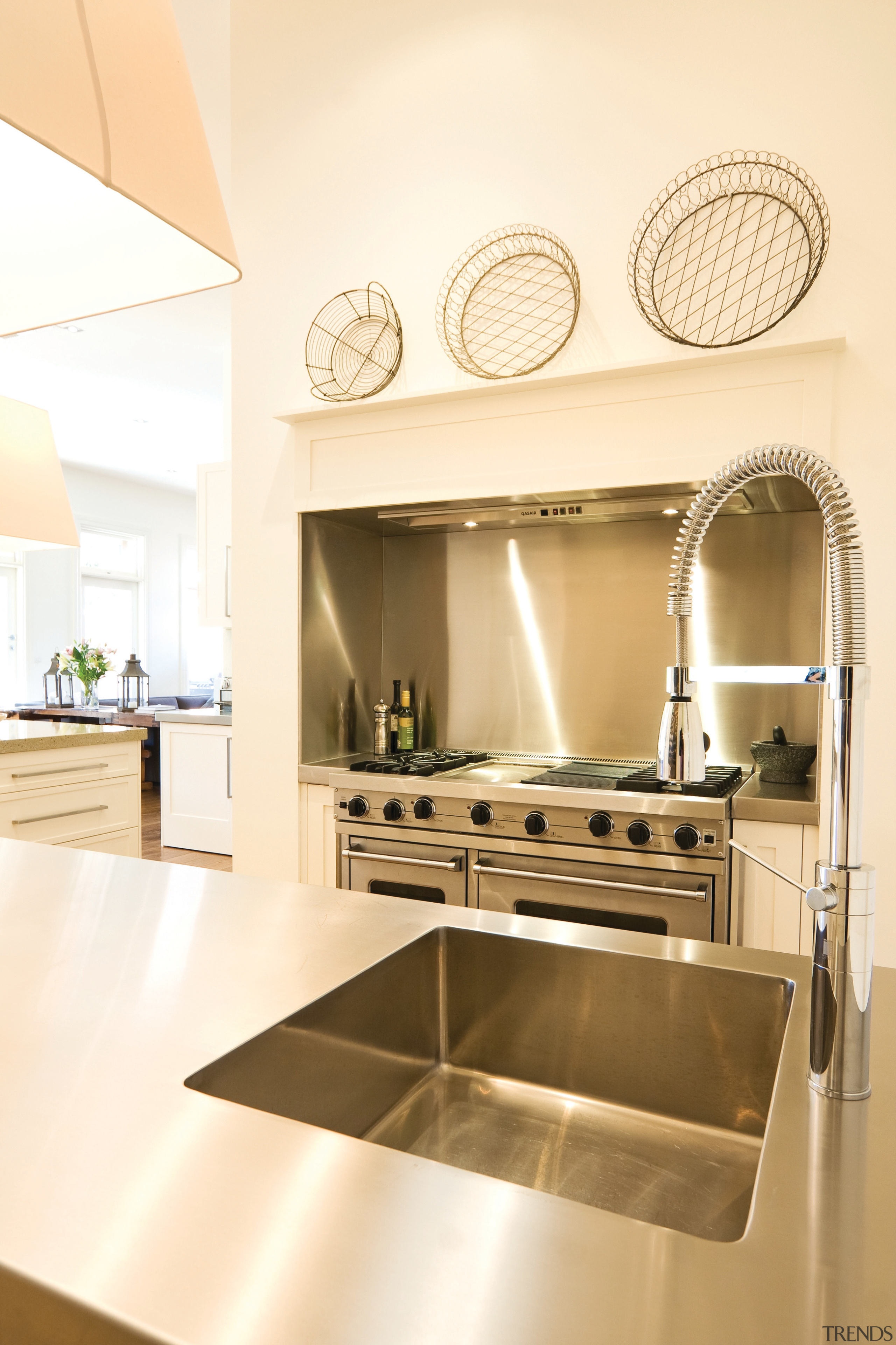 View of a kitchen featuring integrated sink and countertop, floor, flooring, home, interior design, kitchen, product design, room, yellow