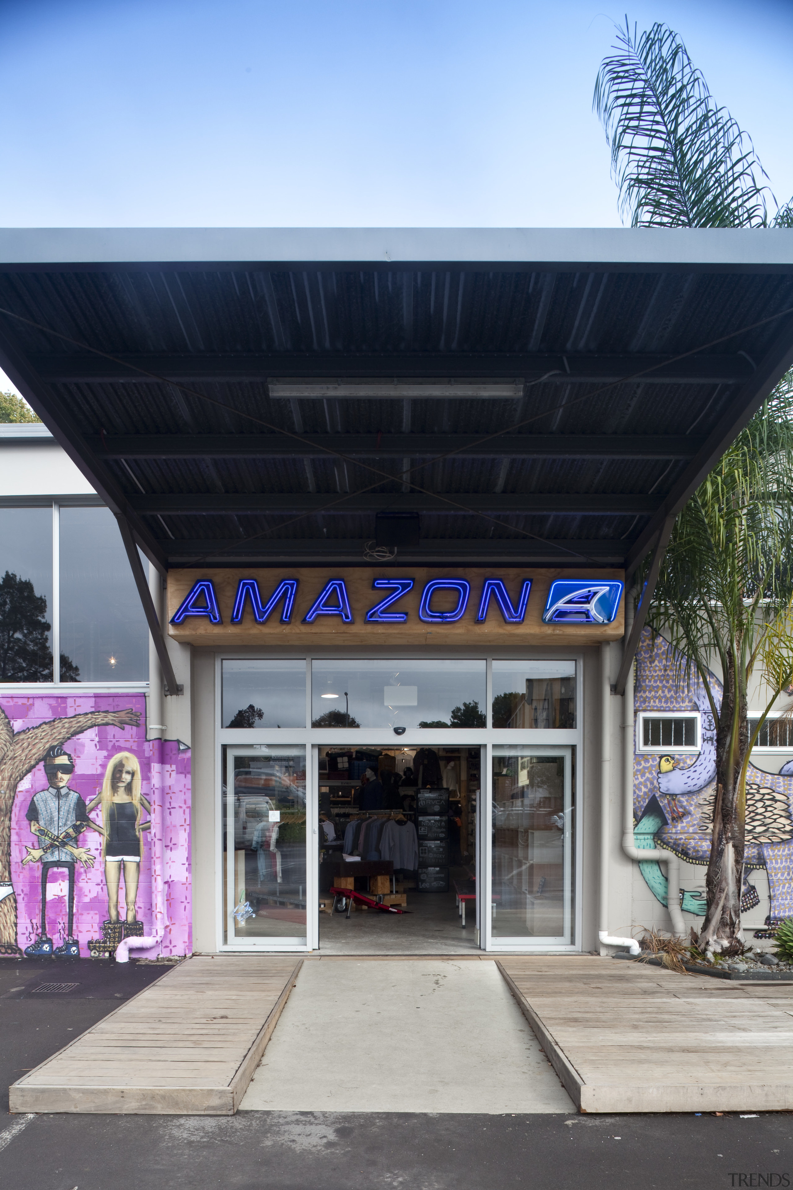 View of retail shop with interior and exterior transport, black, gray