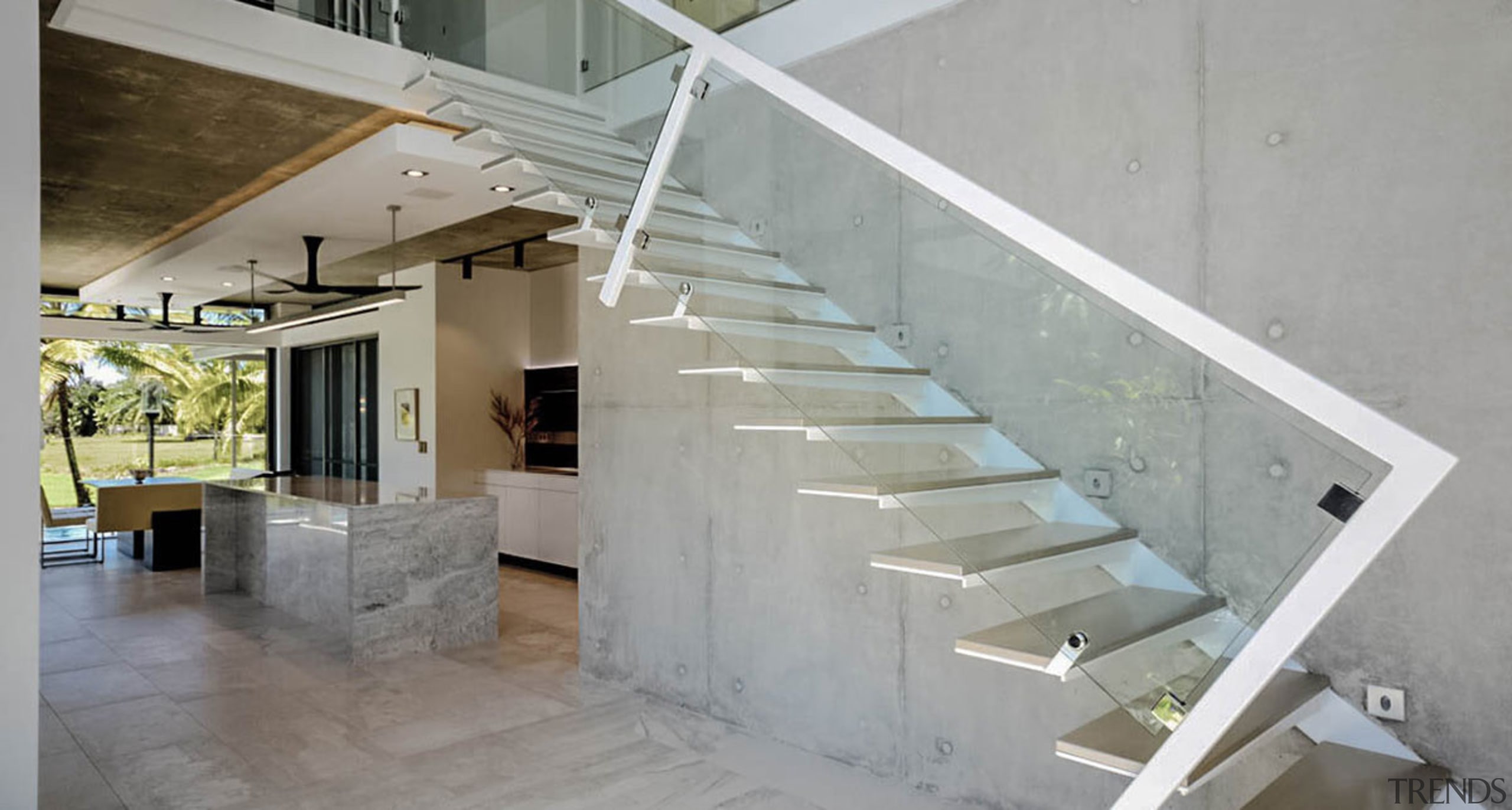 Set in stone – this clean-lined kitchen by architecture, daylighting, floor, flooring, handrail, house, interior design, stairs, structure, gray