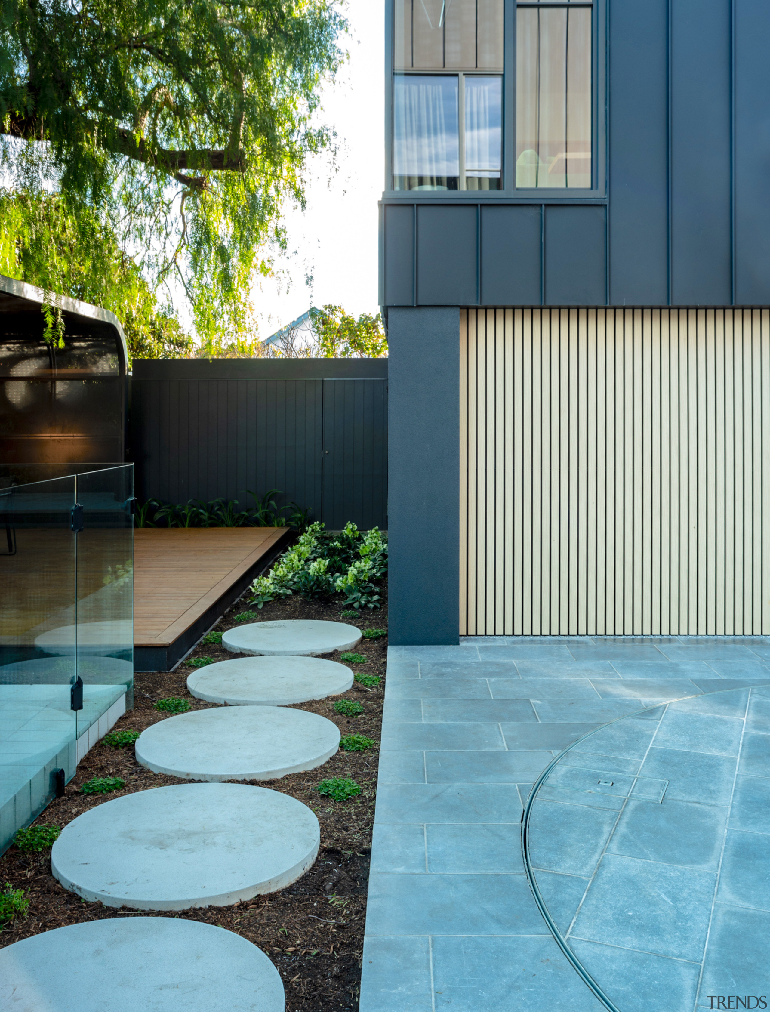Pavers leading to al fresco dining zone. - 