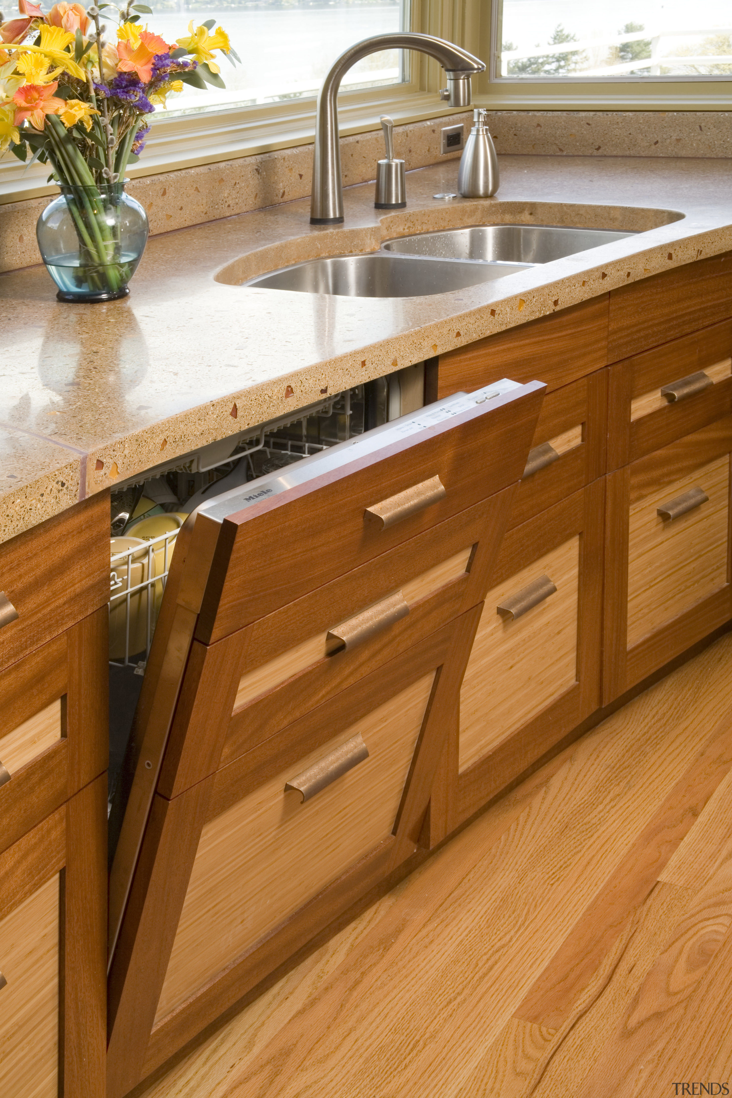 The custom made dishwasher cabinetry - The custom cabinetry, countertop, drawer, floor, flooring, furniture, hardwood, kitchen, laminate flooring, plywood, sink, wood, wood flooring, wood stain, brown, orange