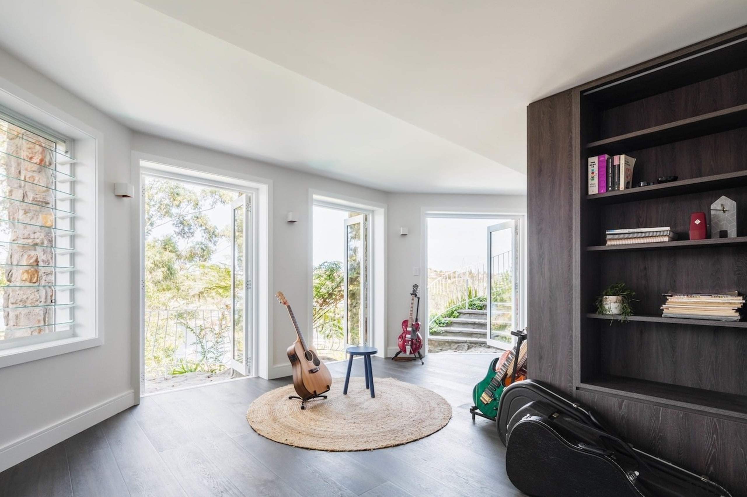 Expansive glass doors open out to the yard architecture, home, house, interior design, living room, real estate, room, window, white, gray