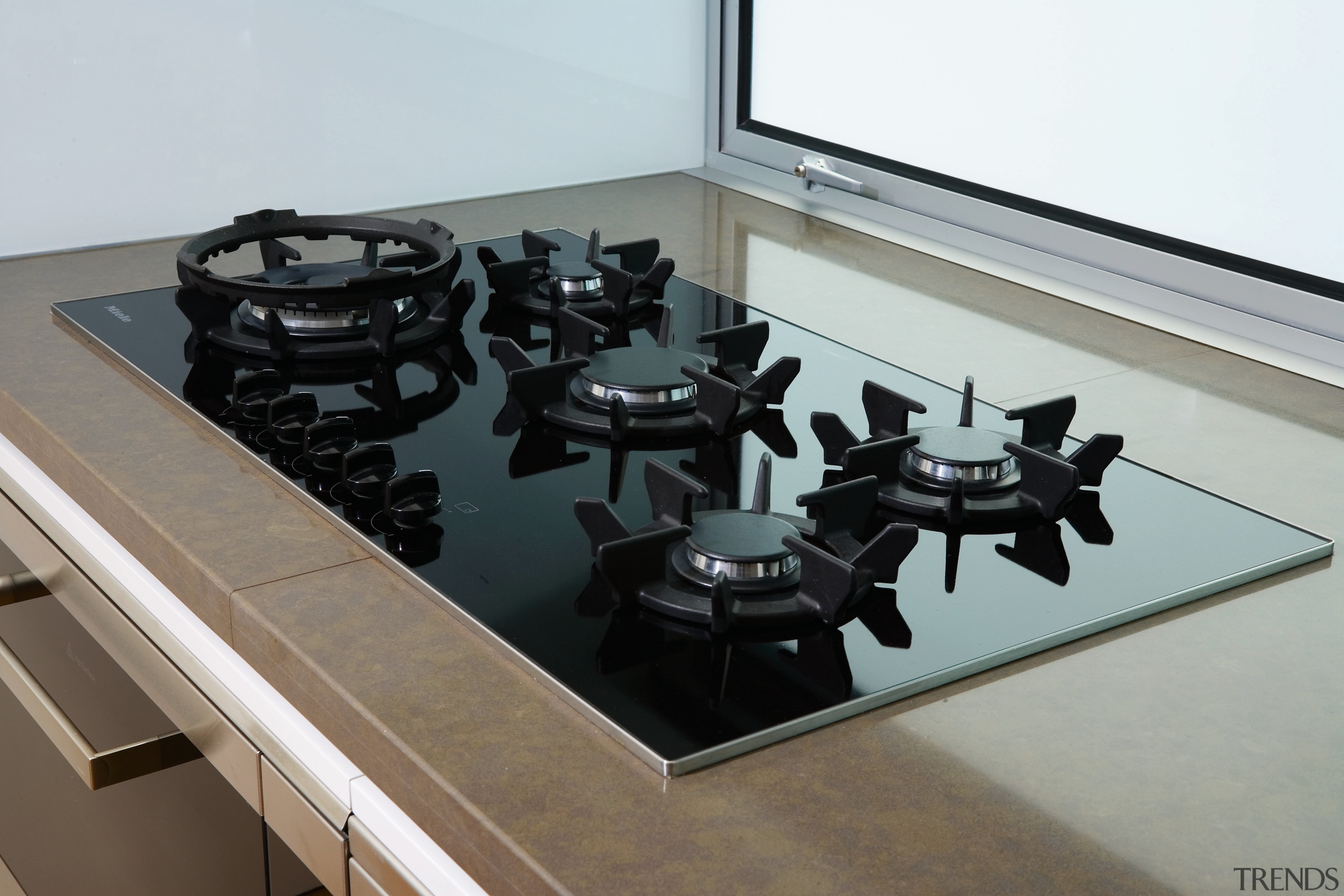 A view of some kitchen appliances from Miele. furniture, product design, table, gray, white