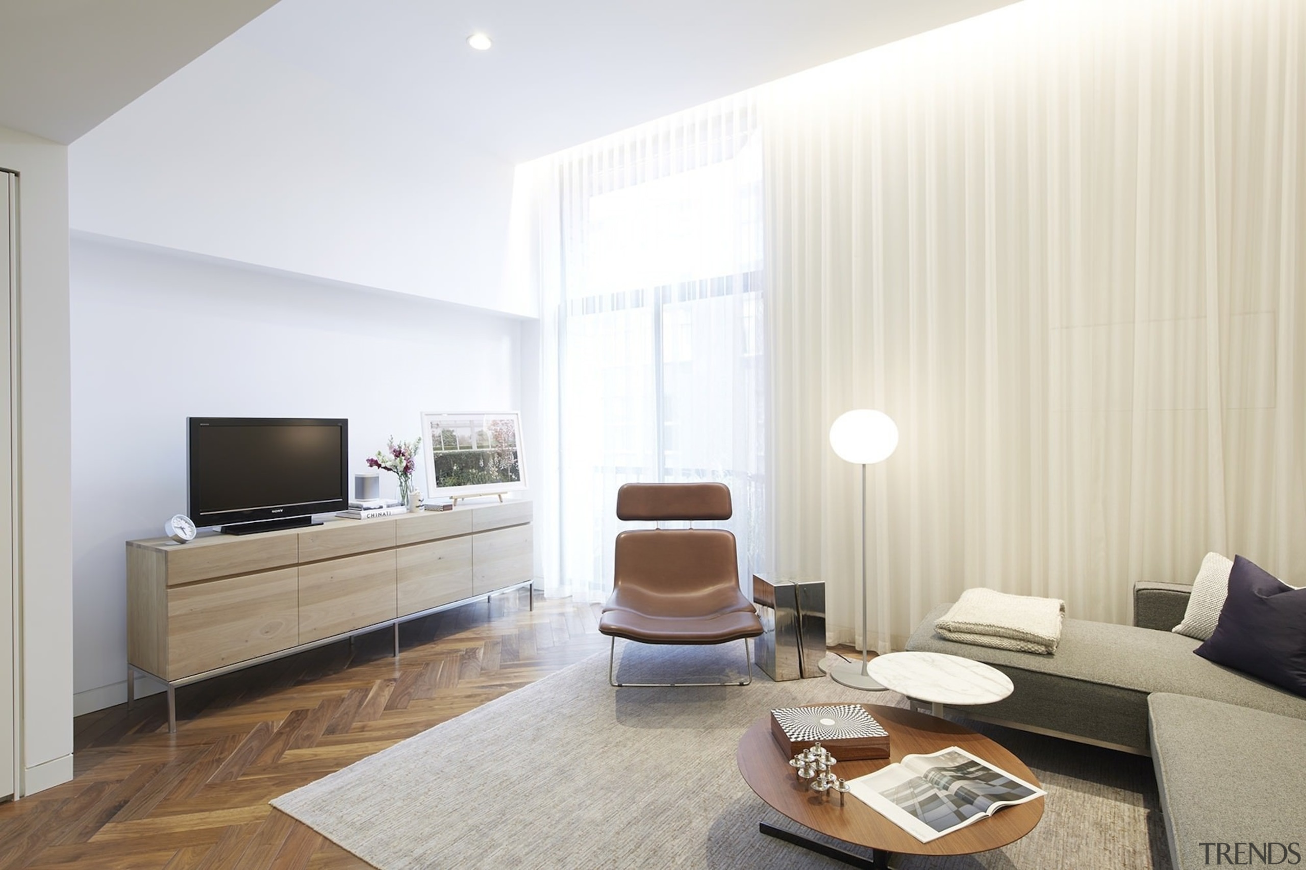 The lounge is spacious, full of light and ceiling, floor, interior design, interior designer, living room, property, real estate, room, wall, white