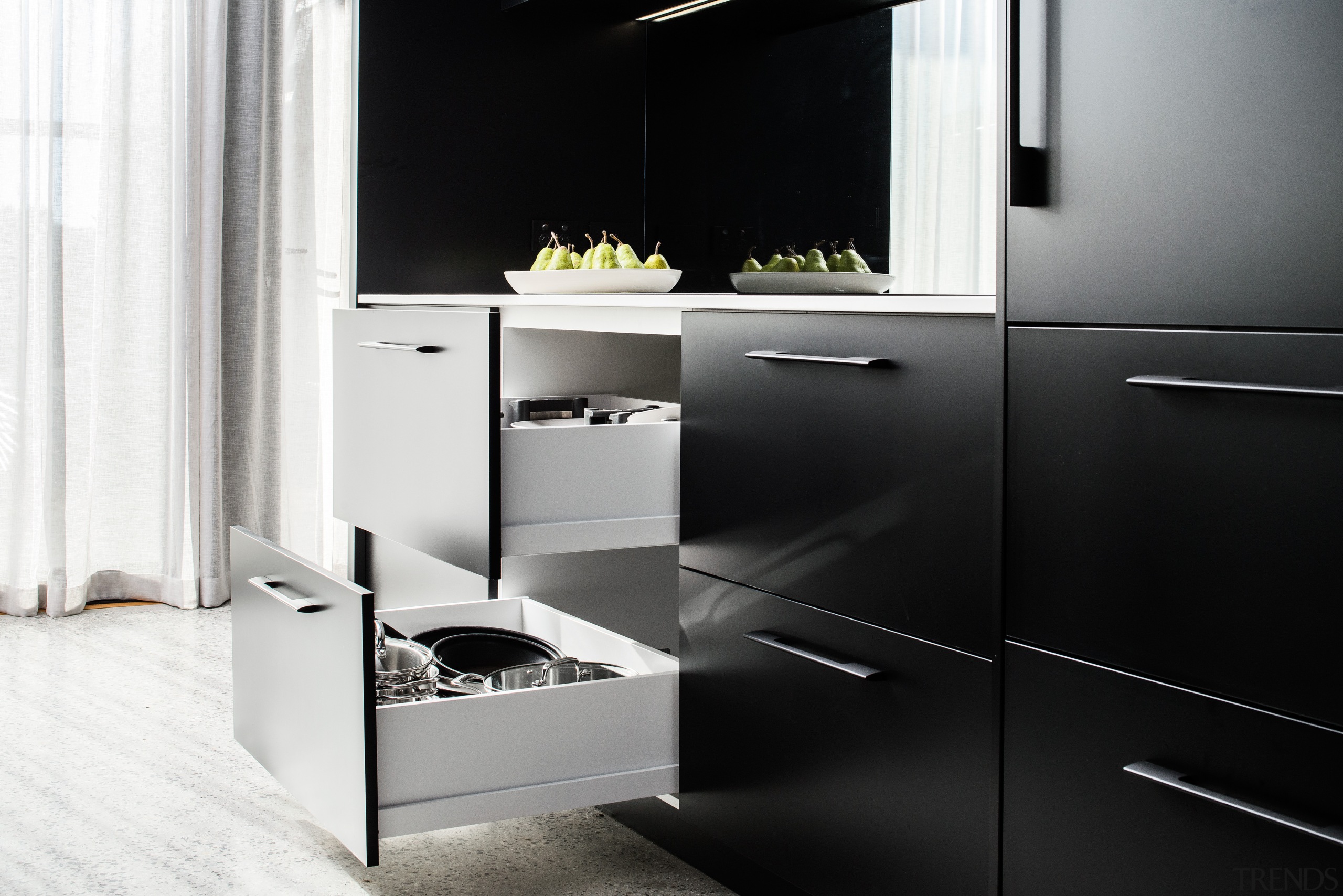 ​​​​​​​One way to gain storage in your kitchen black, black-and-white, cabinetry, countertop, cupboard, door, drawer system, furniture, gloss, kitchen, kitchen stove, cabinety, sink, tap, tile, black, white, Impact Kitchens