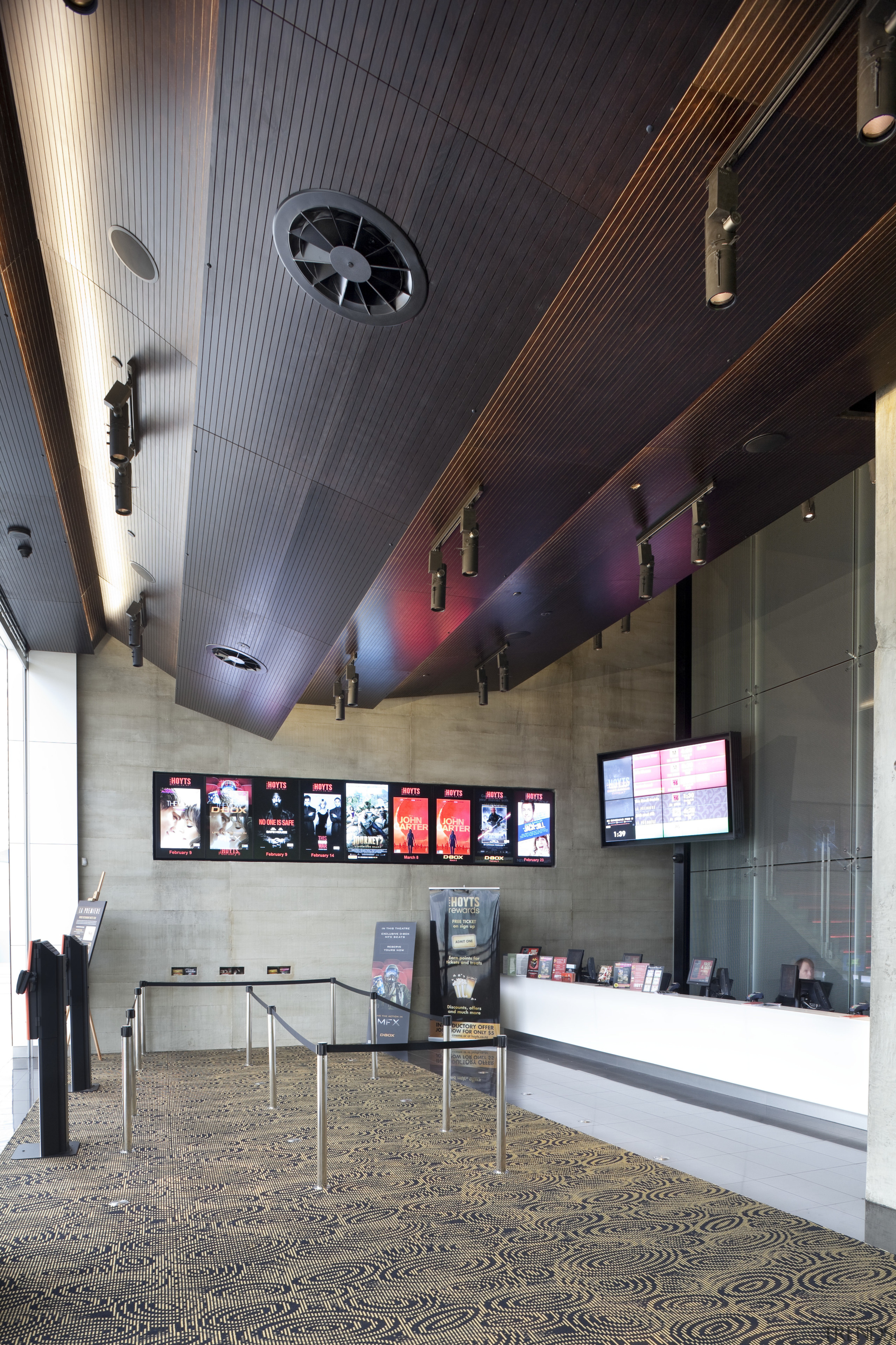 View of retail kiosk with dark ceilling with architecture, ceiling, interior design, black, gray