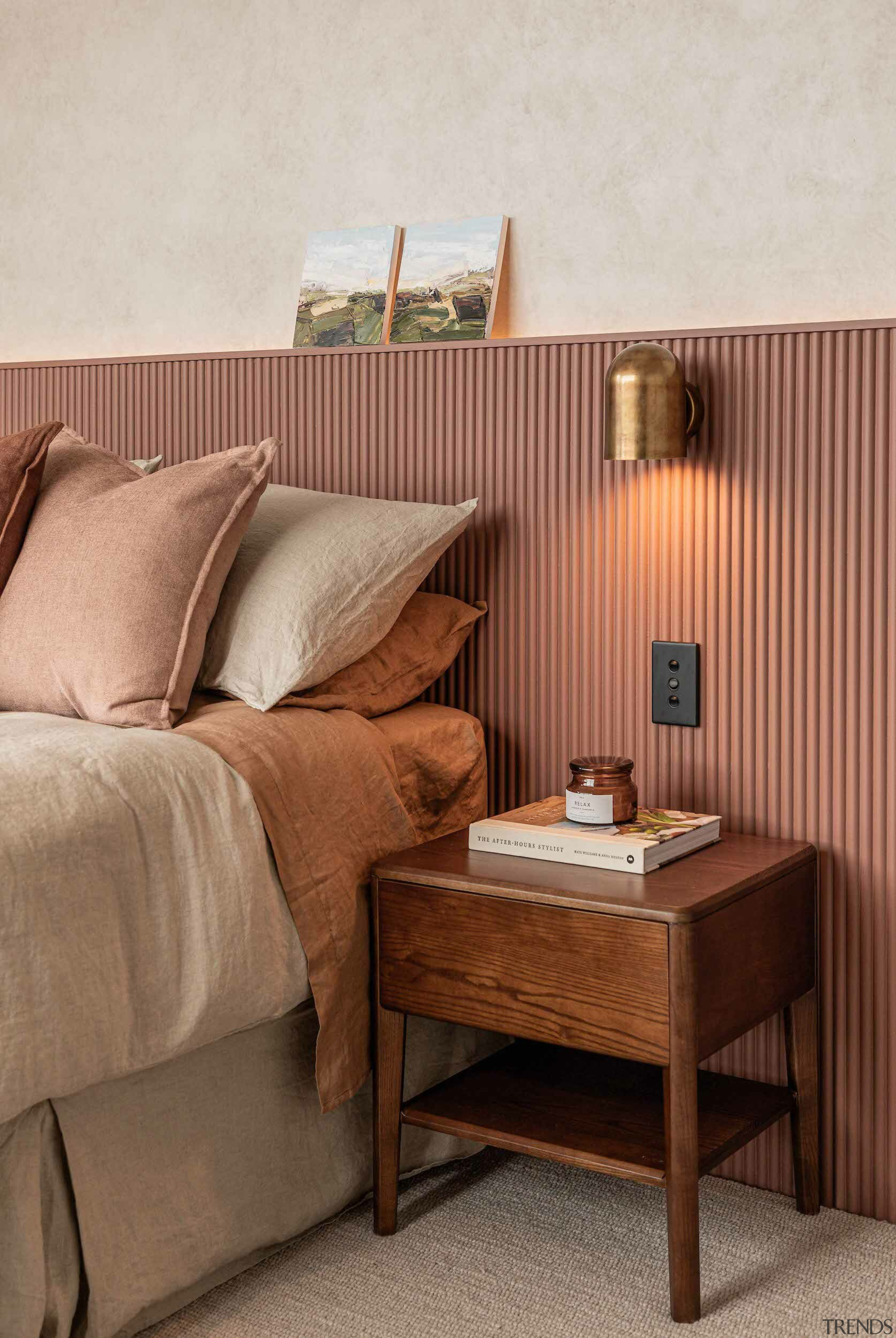 A feature 'bedhead' wall finish has a crenulated 