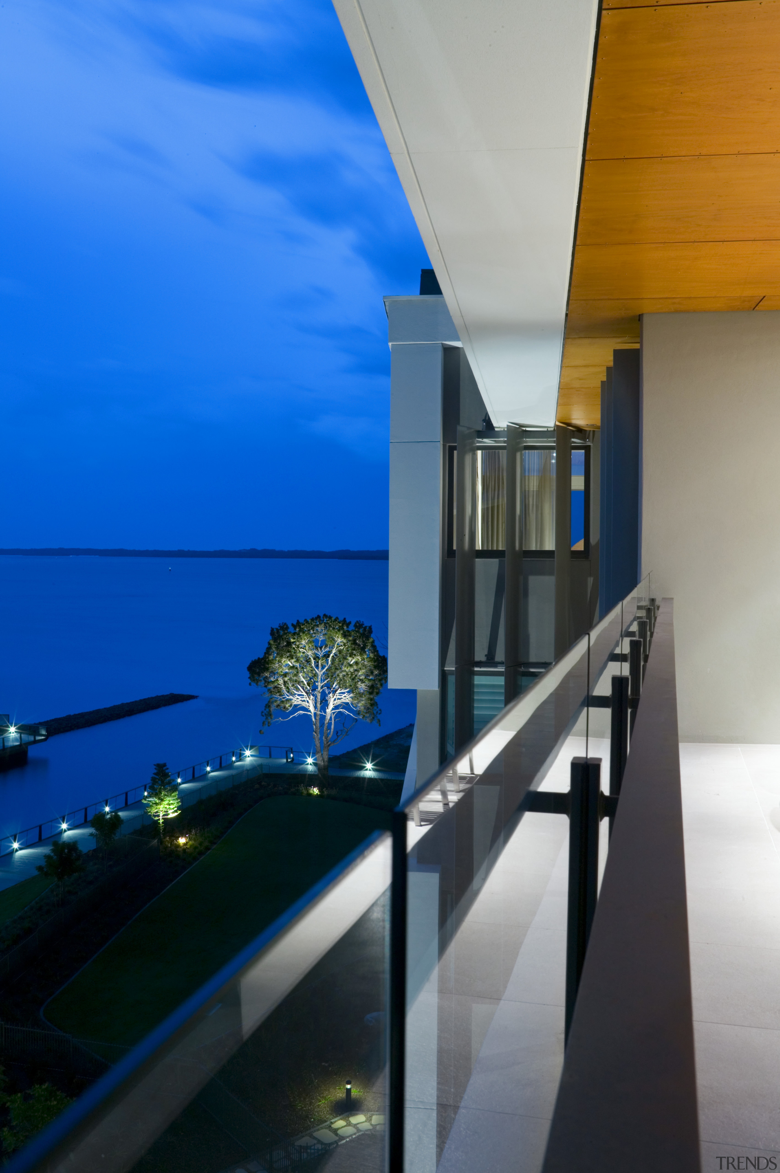 An exterior view of the New Stocland Allisse apartment, architecture, blue, condominium, daylighting, glass, home, house, interior design, lighting, real estate, reflection, sea, sky, water, blue, black