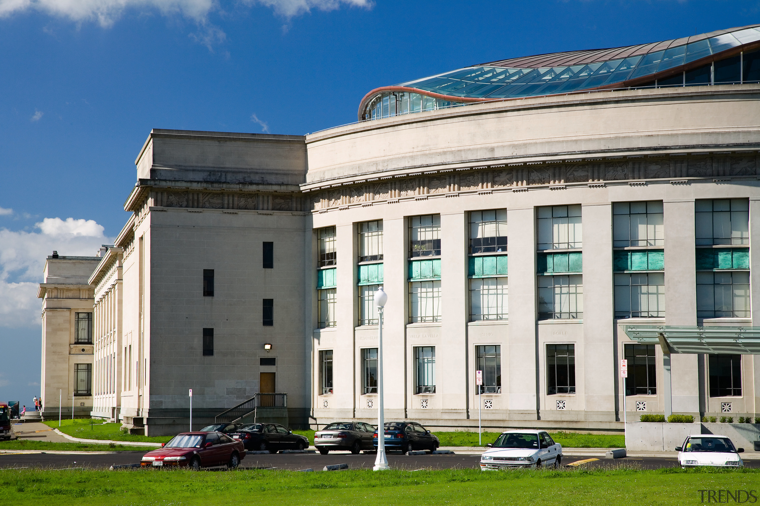 An exterior view of the newly renovated Auckland architecture, building, city, classical architecture, corporate headquarters, daytime, estate, facade, house, landmark, metropolitan area, real estate, sky, window, white