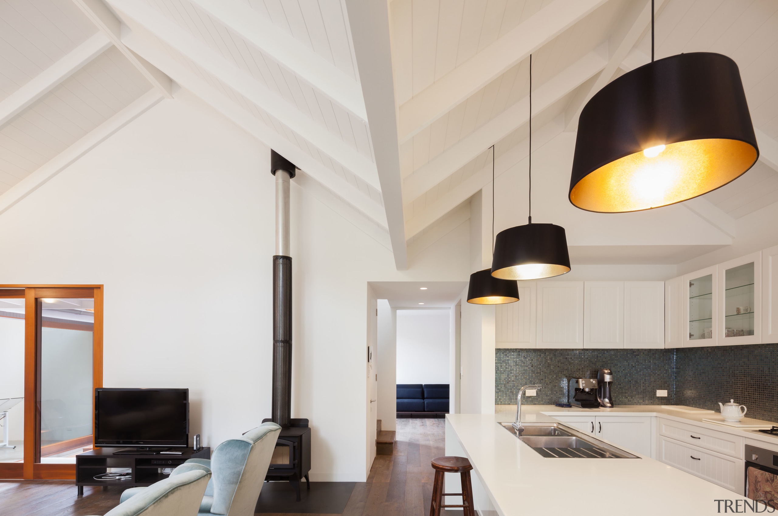 This kitchen is set close to the dining architecture, ceiling, daylighting, interior design, light fixture, product design, gray