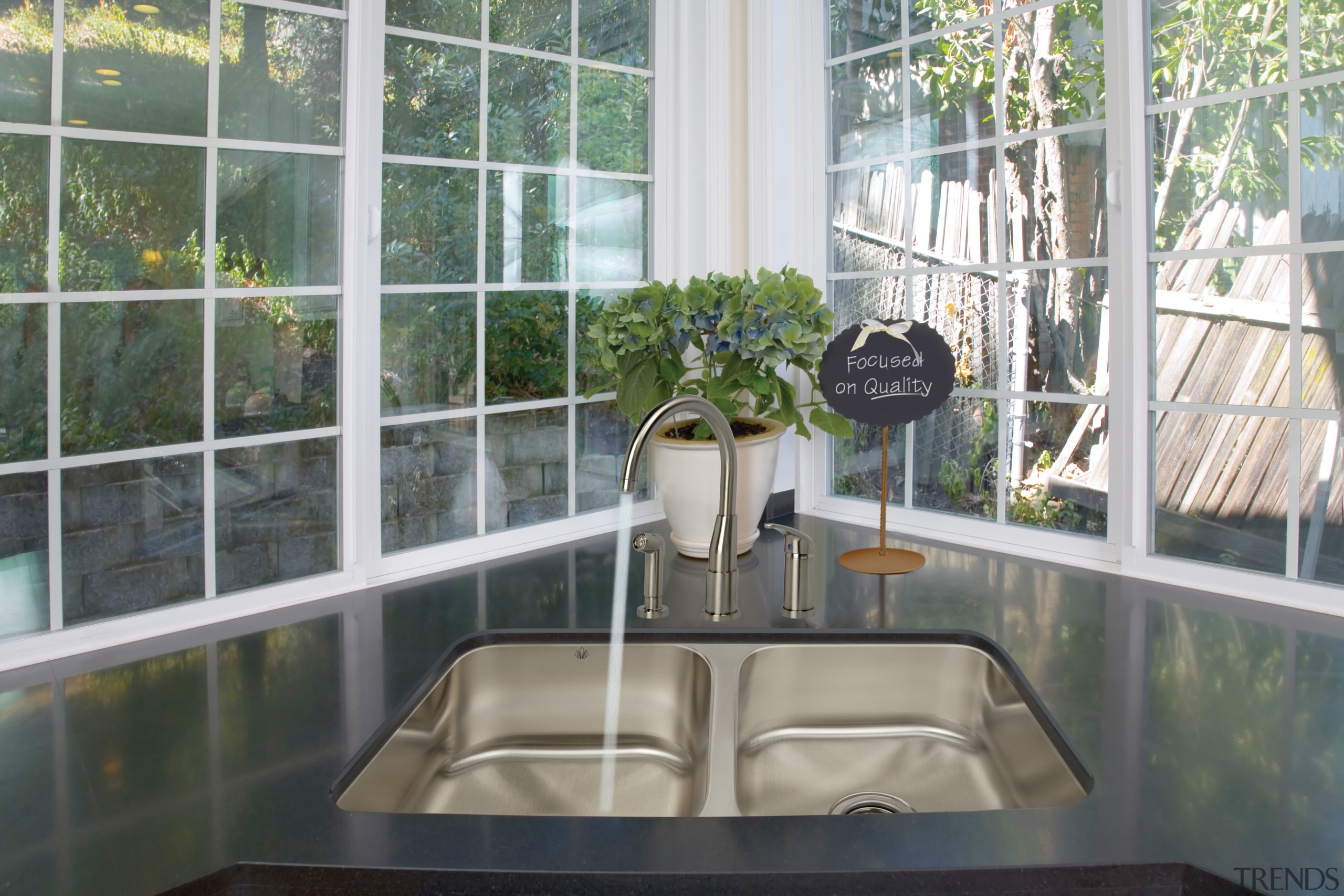 View of kitchen which features sink and arched daylighting, interior design, property, real estate, window, gray