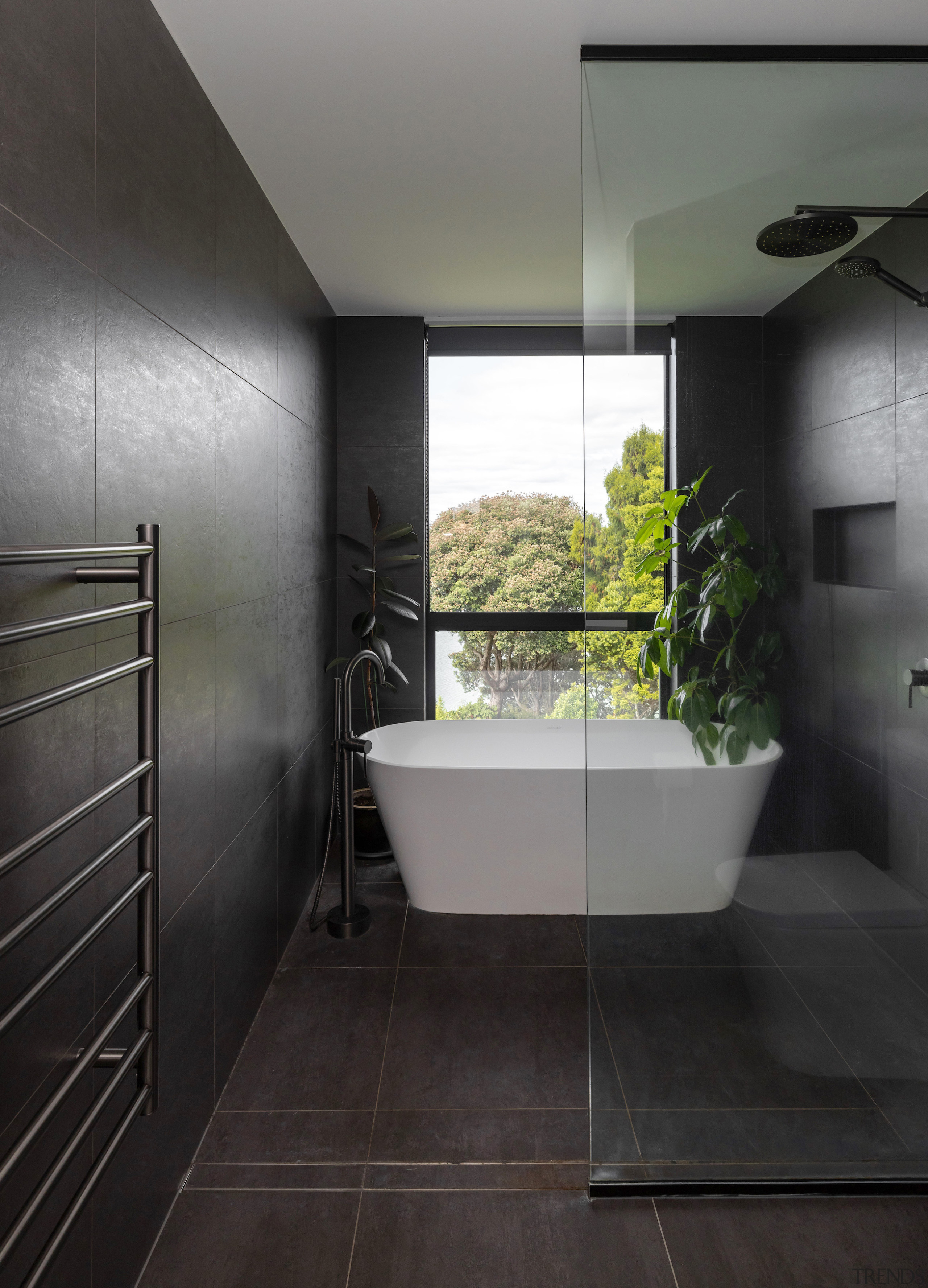 Tub in a dramatic dark setting is centred 