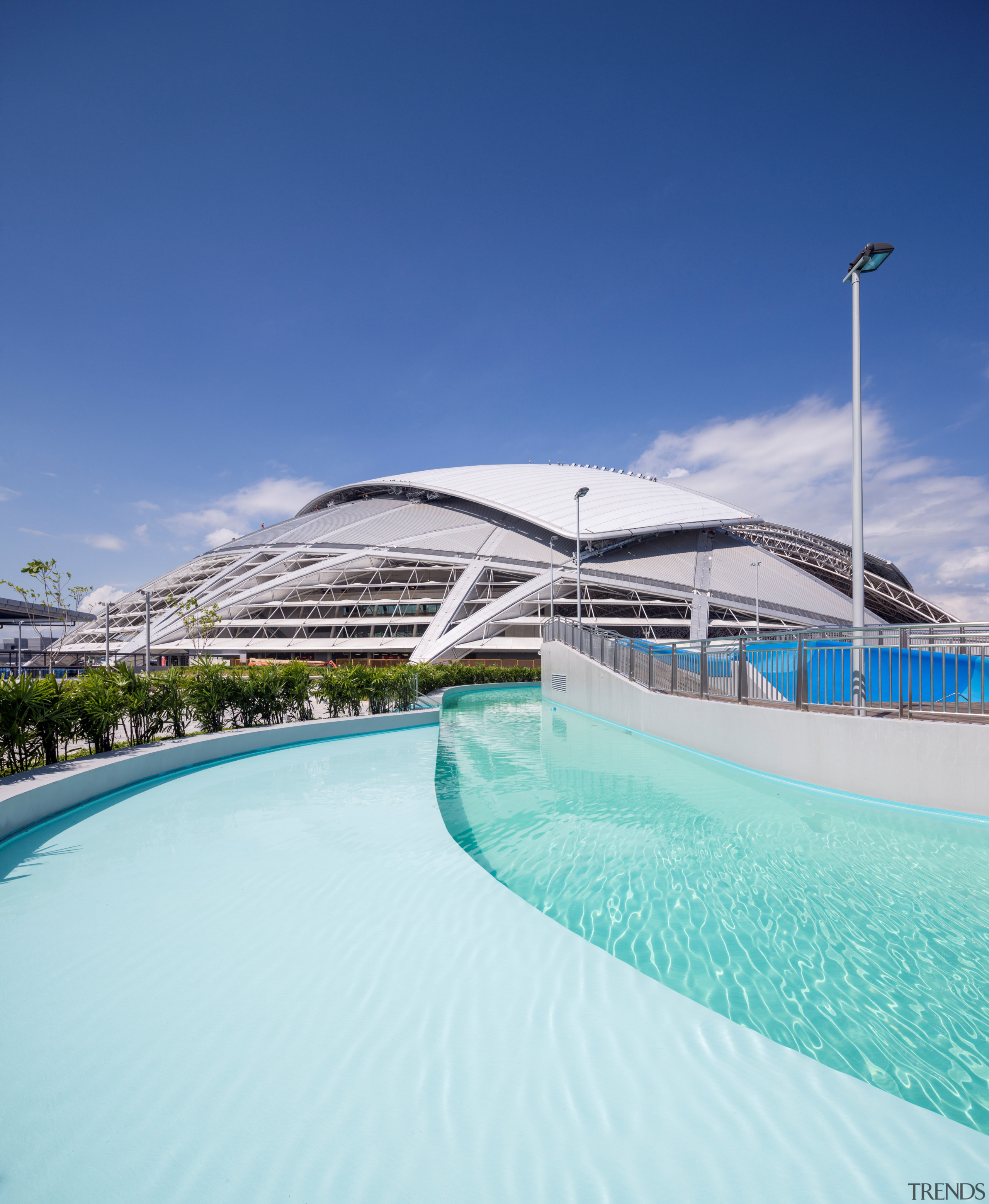 Public amenities at the Singapore Sports Hub include architecture, leisure, resort, sea, sky, swimming pool, vacation, water, blue, teal