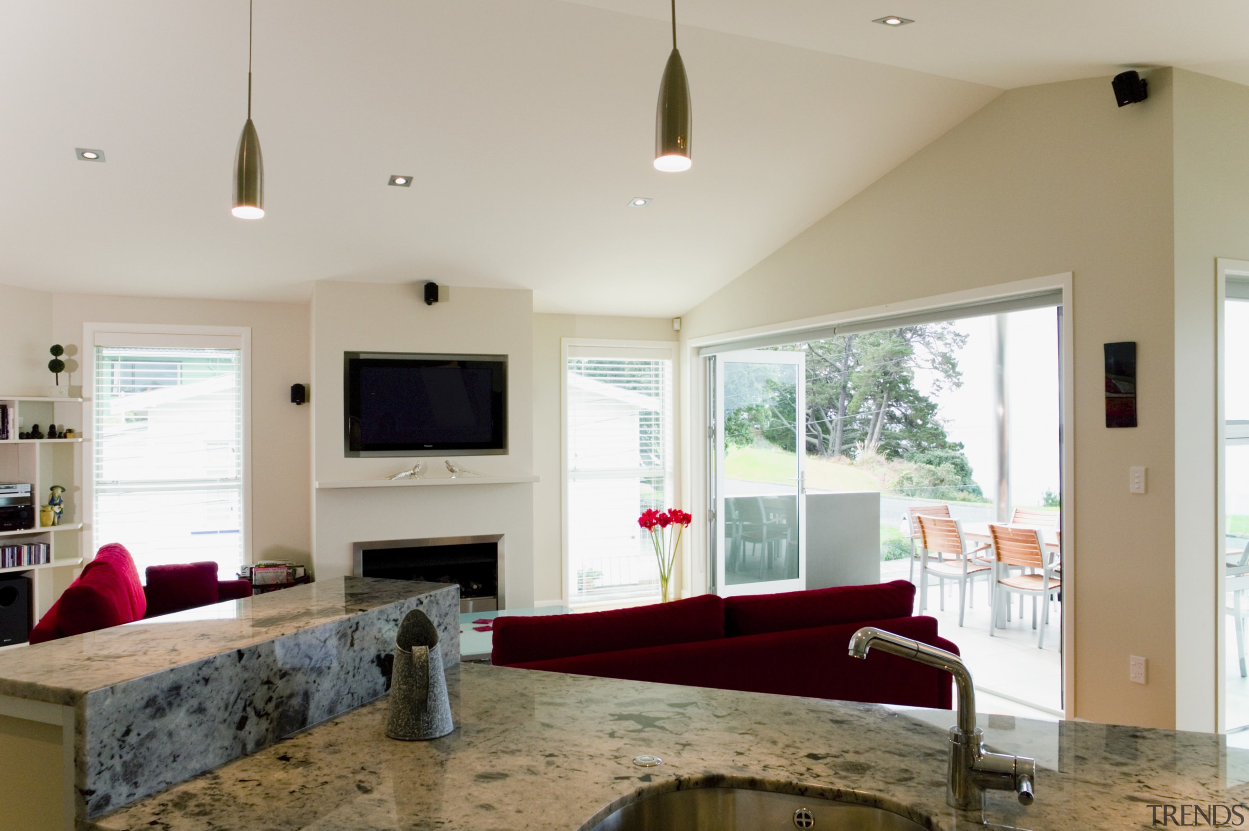 Kitchen and dining area inside contemporary home designed ceiling, floor, home, house, interior design, living room, real estate, room, table, window, gray