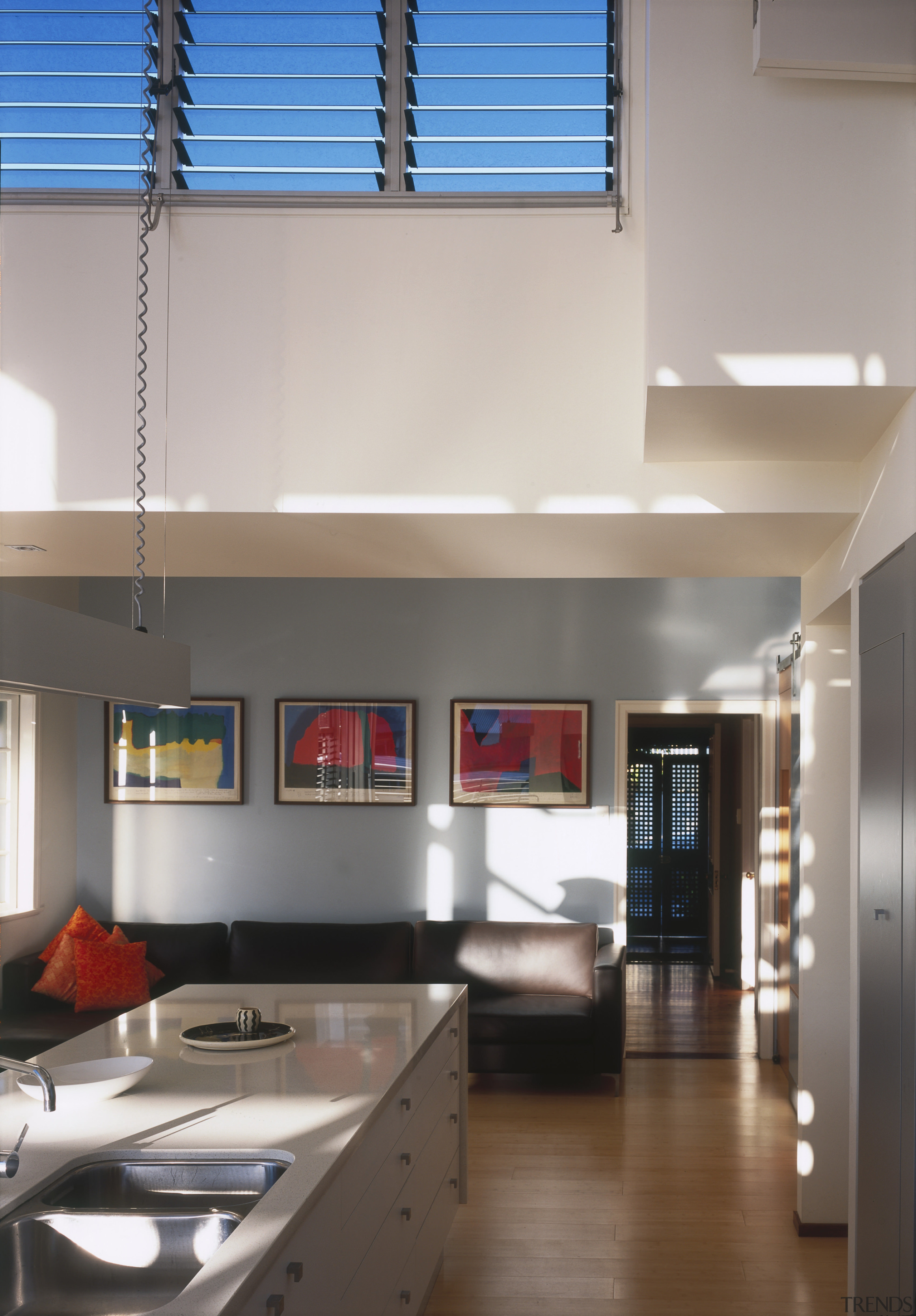 View of kitchen area a long kitchen island, architecture, ceiling, countertop, daylighting, house, interior design, kitchen, loft, room, gray