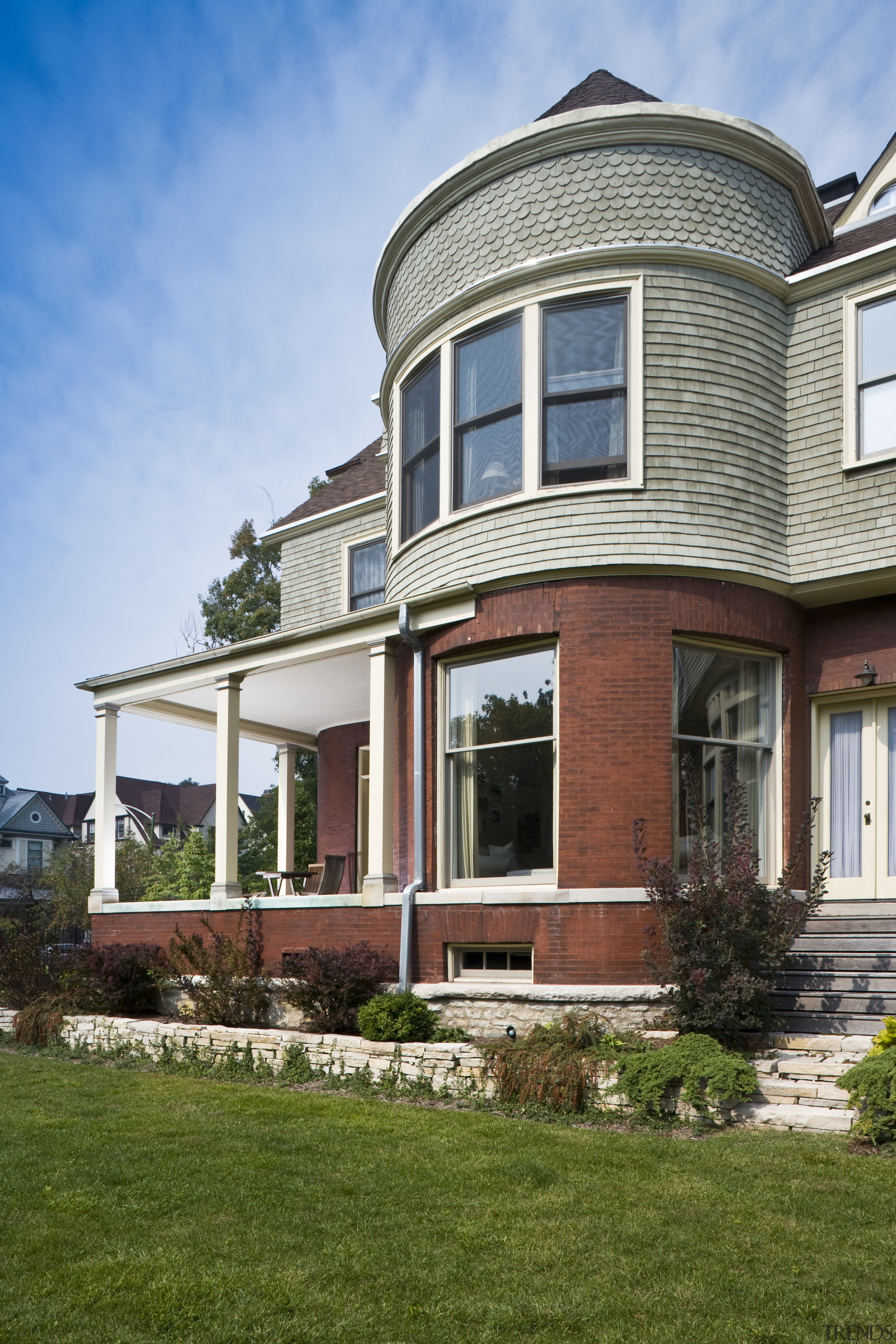 Exterior view of the house showing a Victorian cottage, elevation, estate, facade, farmhouse, historic house, home, house, landscaping, mansion, outdoor structure, porch, property, real estate, residential area, siding, suburb, window, teal, brown