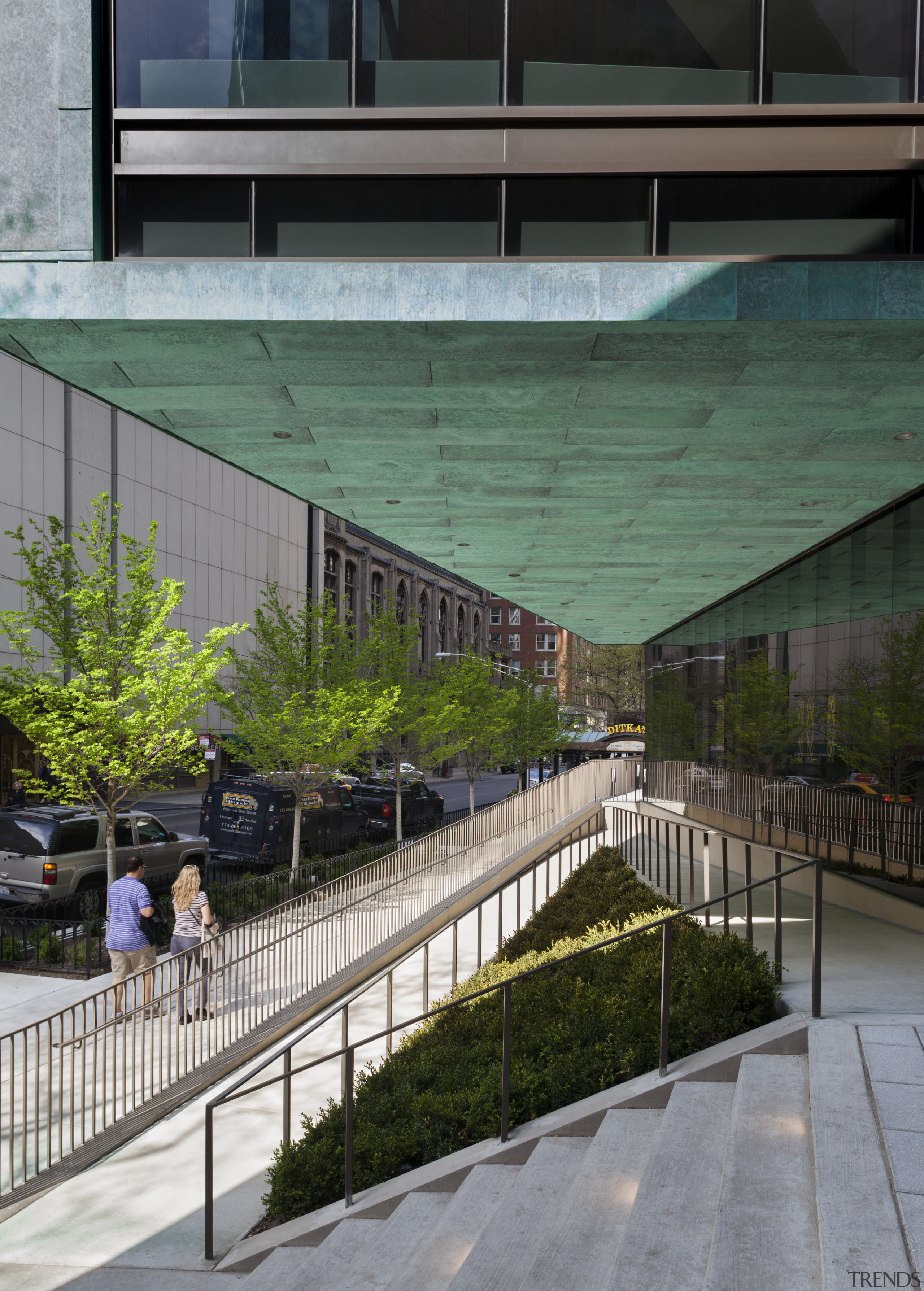 This cantilevered facade on the The Genevieve and architecture, building, condominium, courtyard, facade, house, metropolitan area, mixed use, reflection, residential area, structure, tree, urban design, window, gray, black