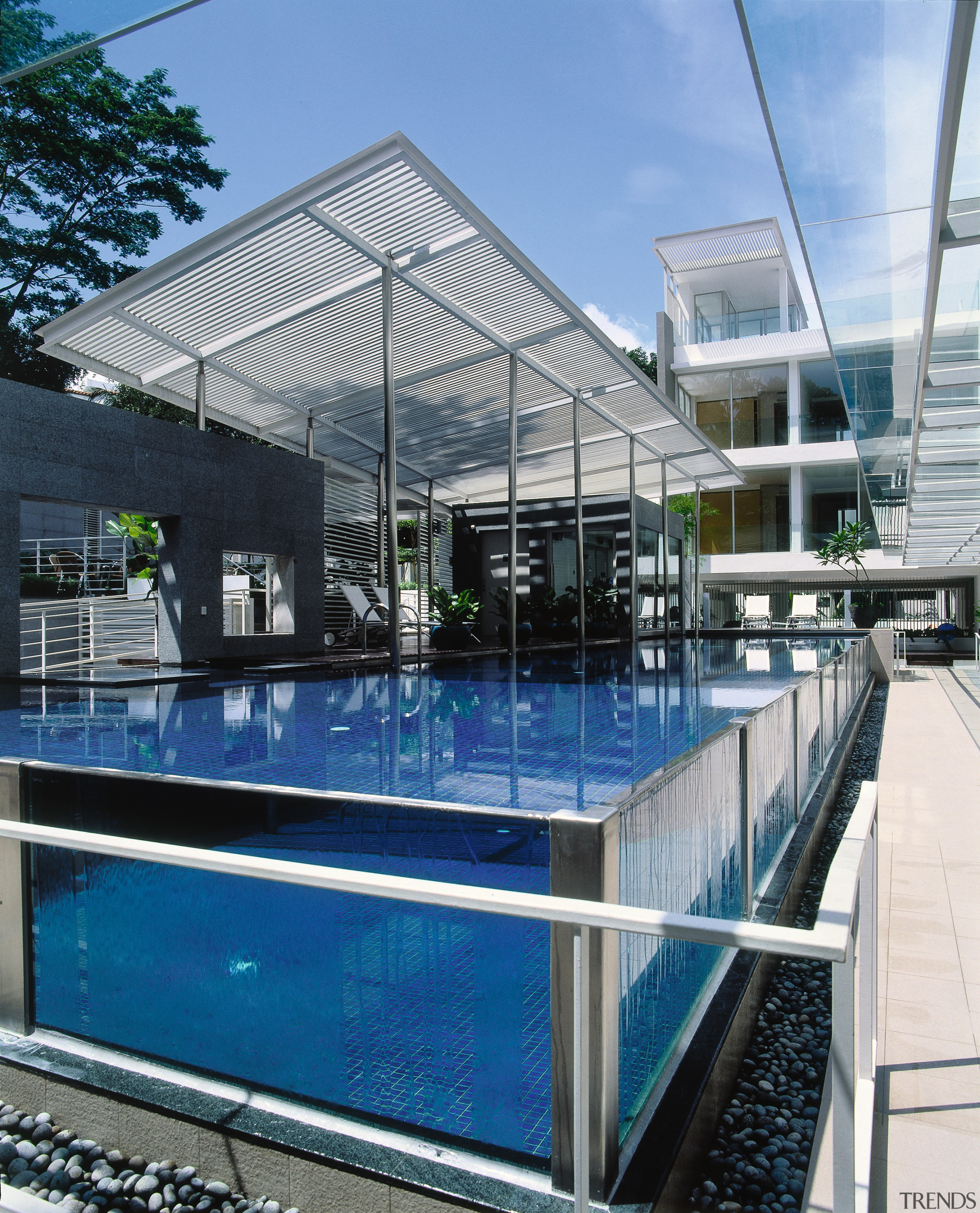 A view of the swimming pool, aluminium louvres, architecture, condominium, corporate headquarters, daylighting, leisure centre, real estate, swimming pool, water