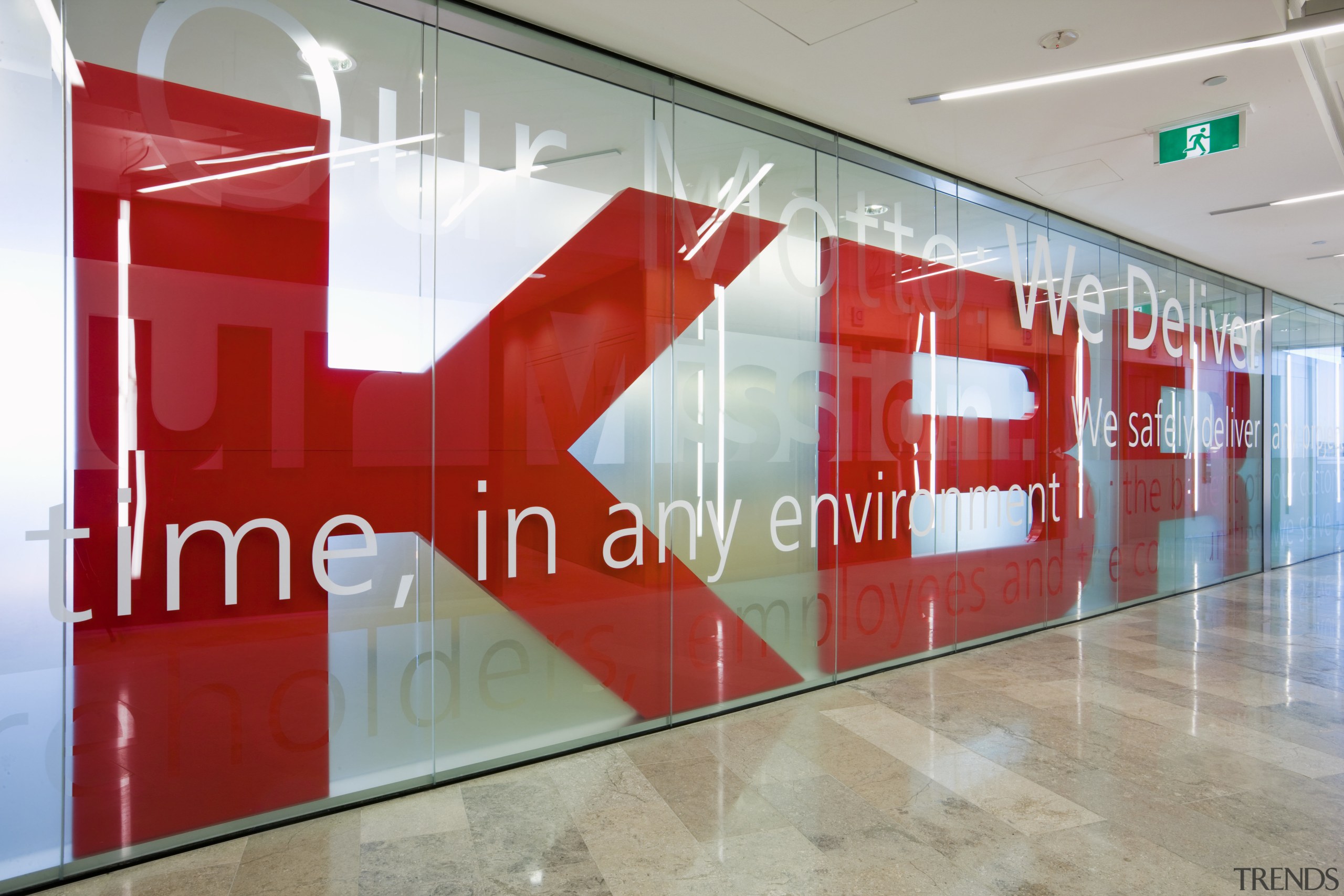 KBR's name is splashed across the foyer in glass, interior design, wall, gray, red