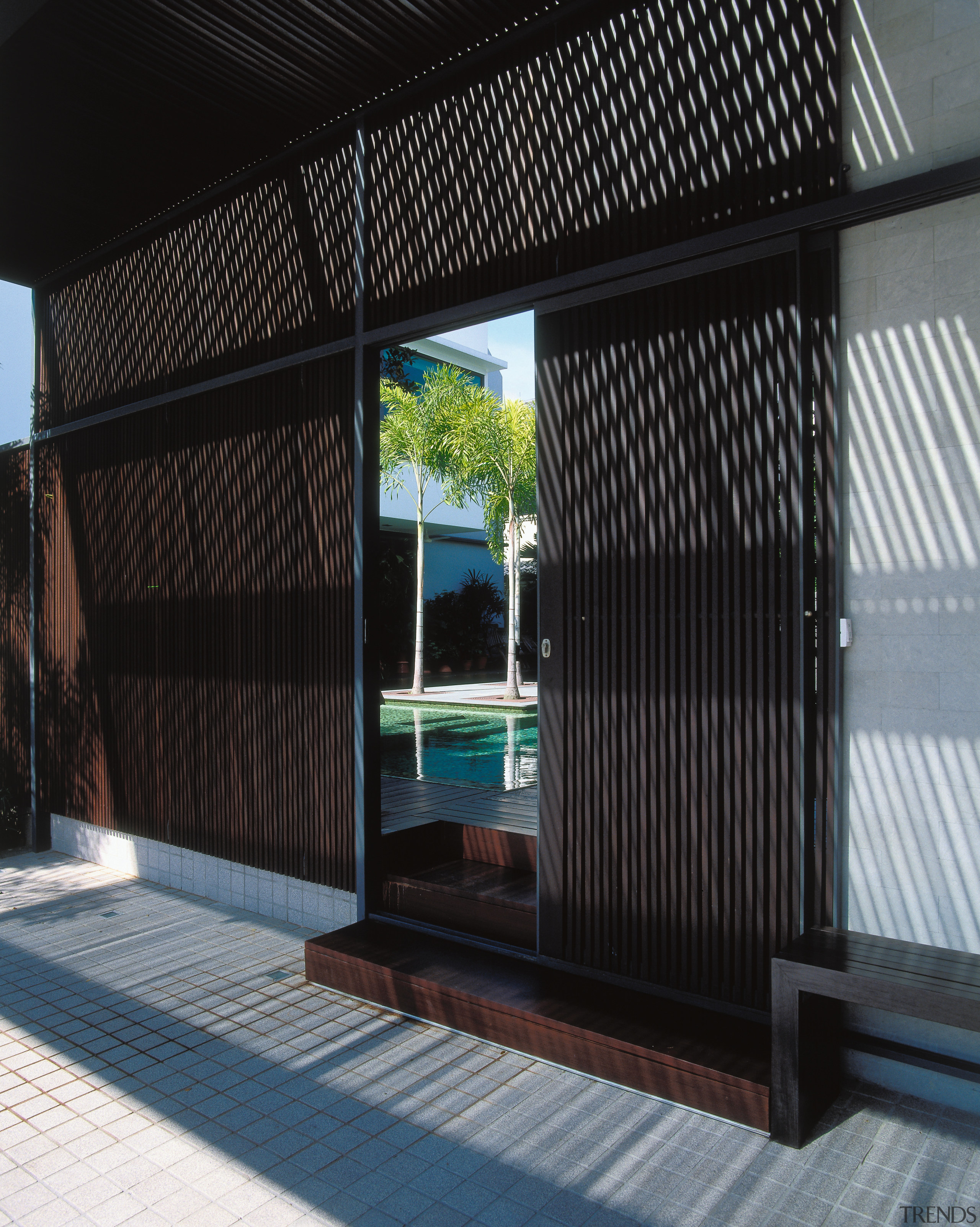 the main entrance to the house is through architecture, facade, house, property, window, black