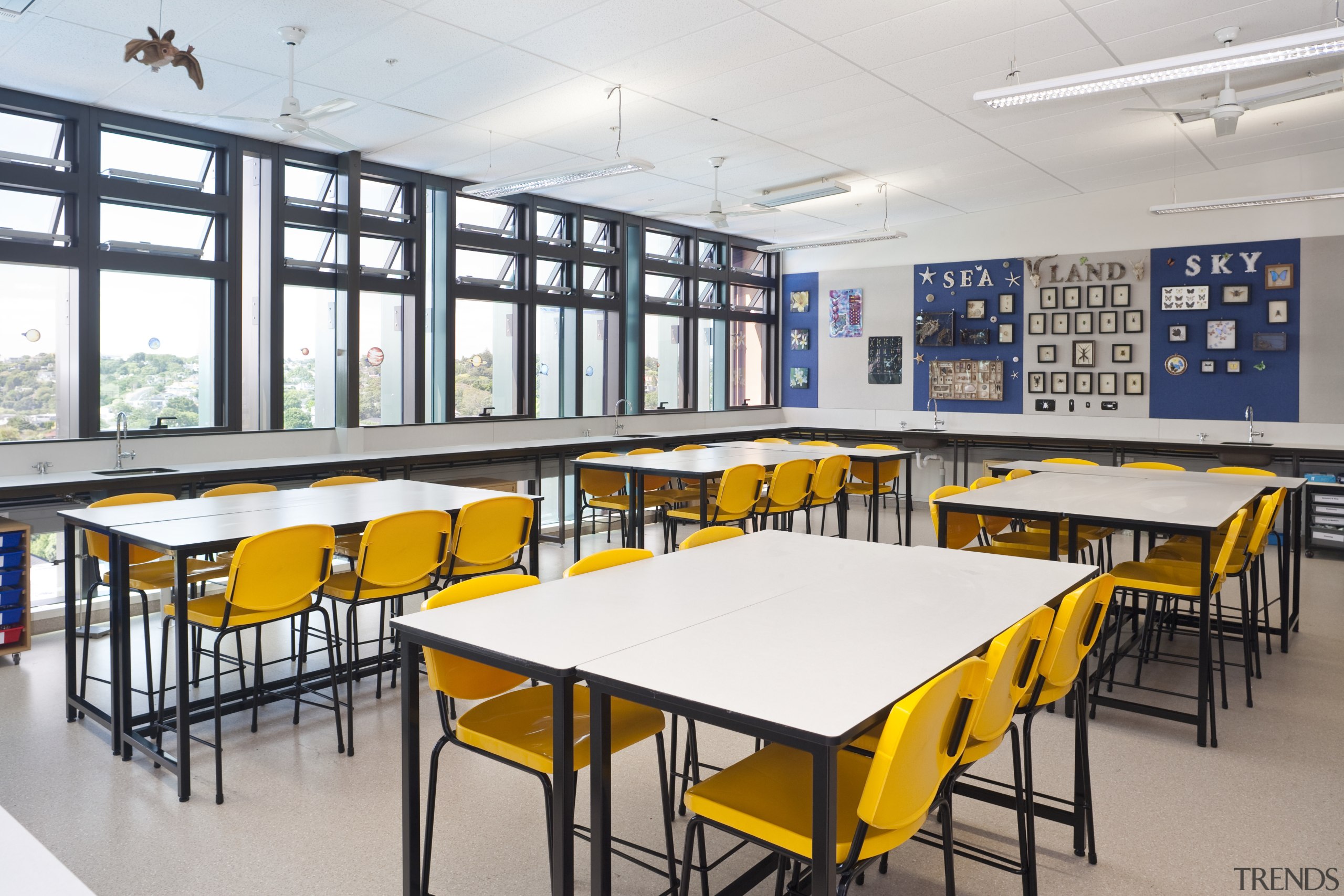 View of teaching spaces at the new technology cafeteria, chair, classroom, furniture, institution, interior design, room, table, gray