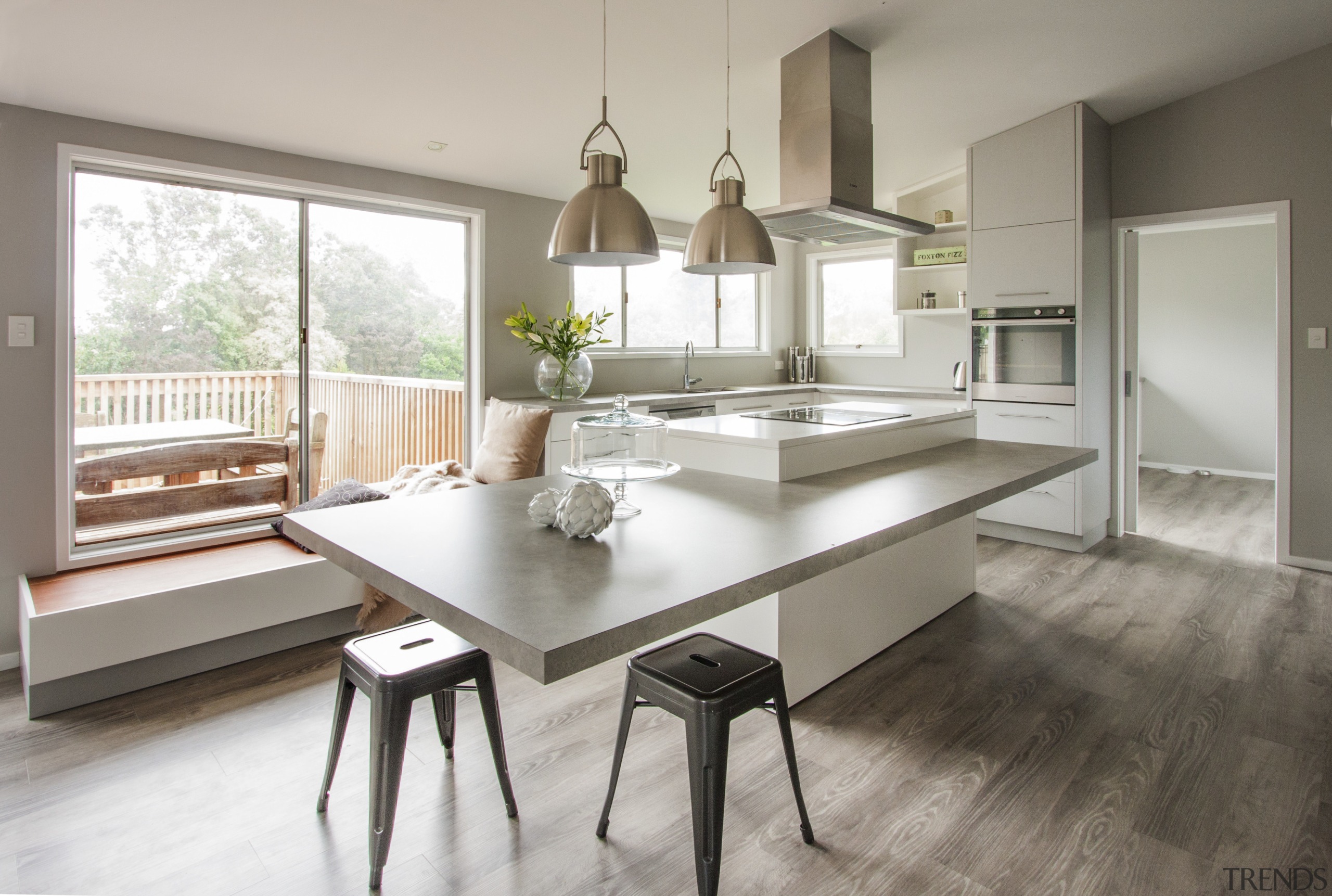 This generous-sized family kitchen by architect Mona Quinn countertop, cuisine classique, dining room, floor, flooring, furniture, interior design, kitchen, room, table, gray