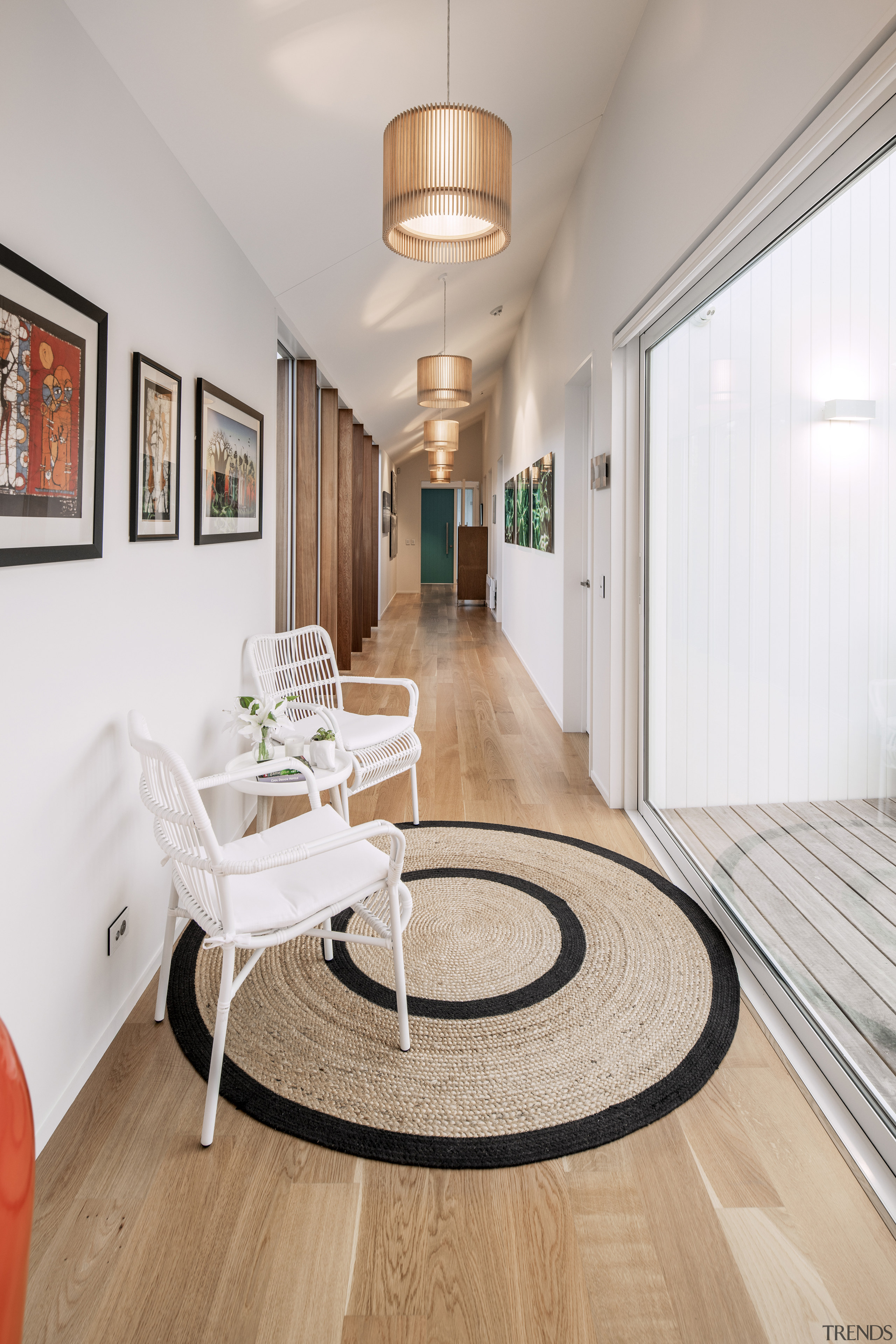 The long circulation corridor opens to the sheltered 