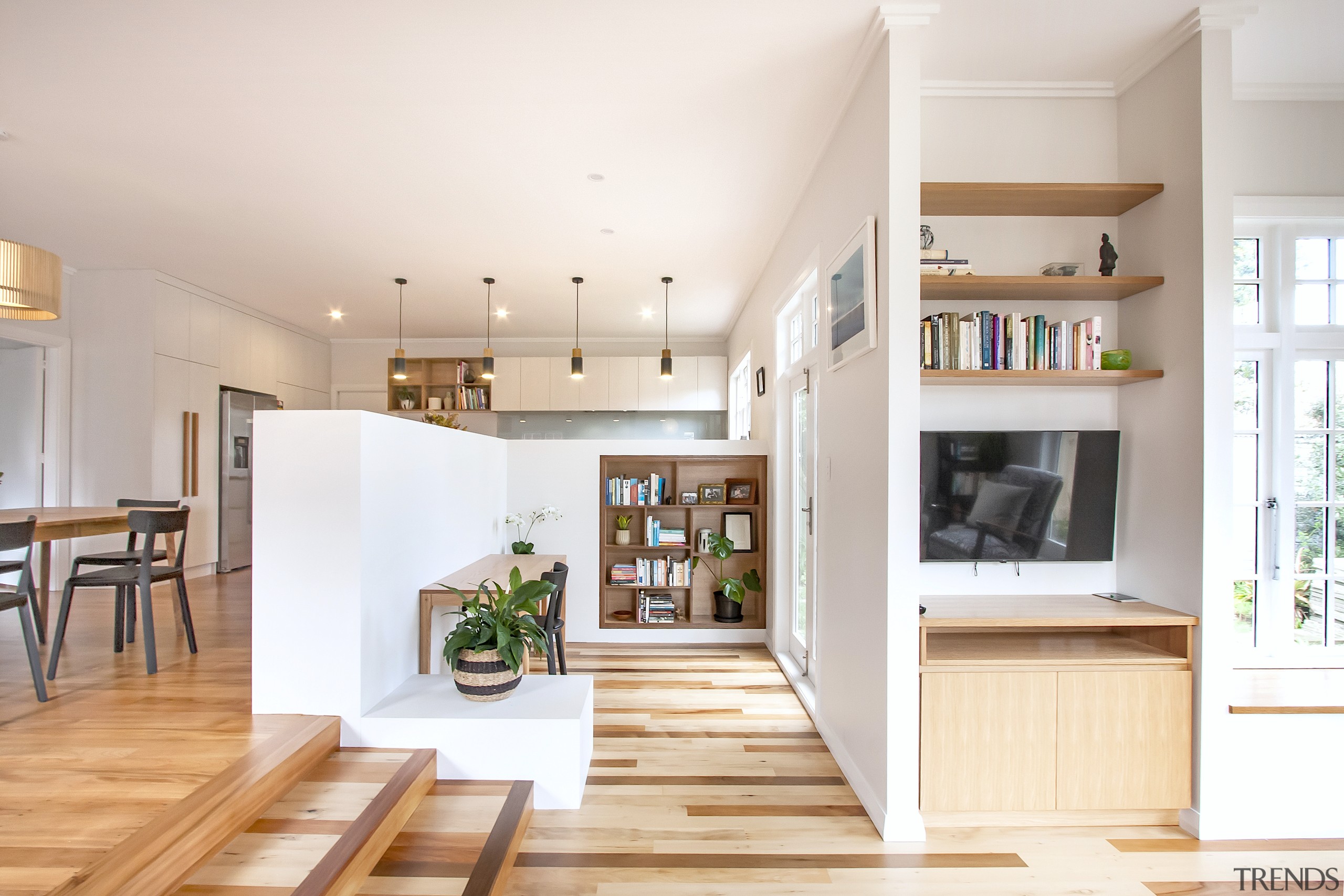 Oak ply shelving incorporated into the 'den' wall 