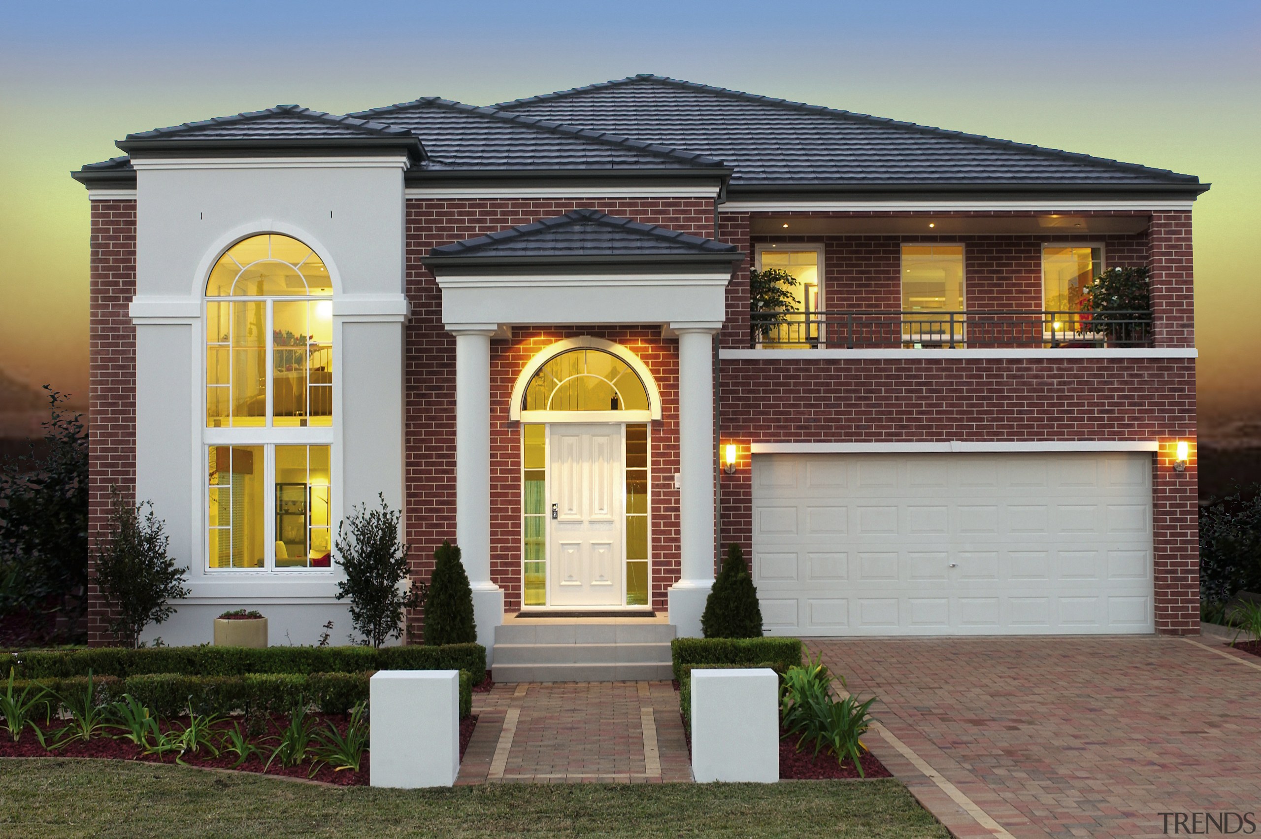 Exterior of brick and concrete clad multi-storey house building, elevation, estate, facade, home, house, property, real estate, residential area, window, gray