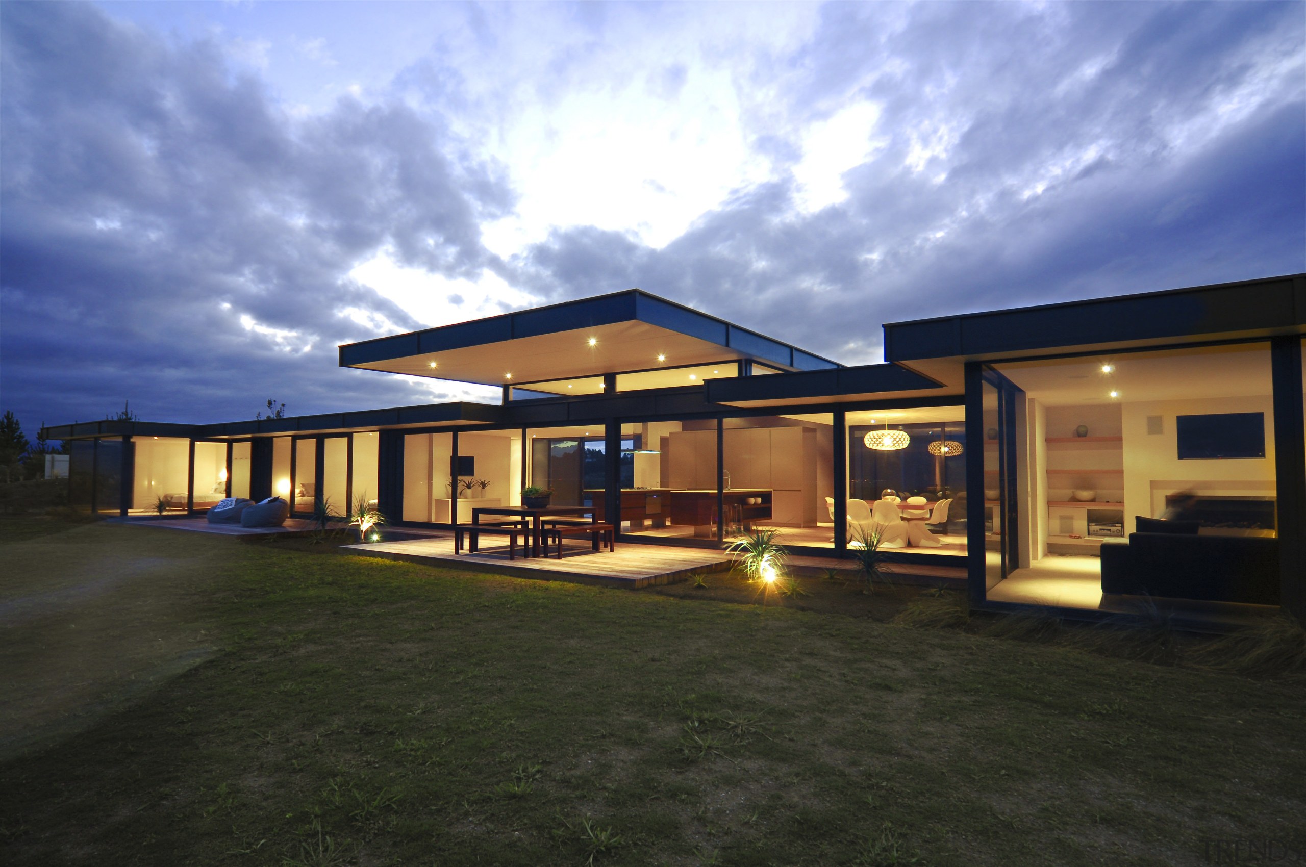 Exterior view of house featuring cladding, roofing, landscaping. architecture, estate, facade, home, house, property, real estate, roof, sky, black, teal