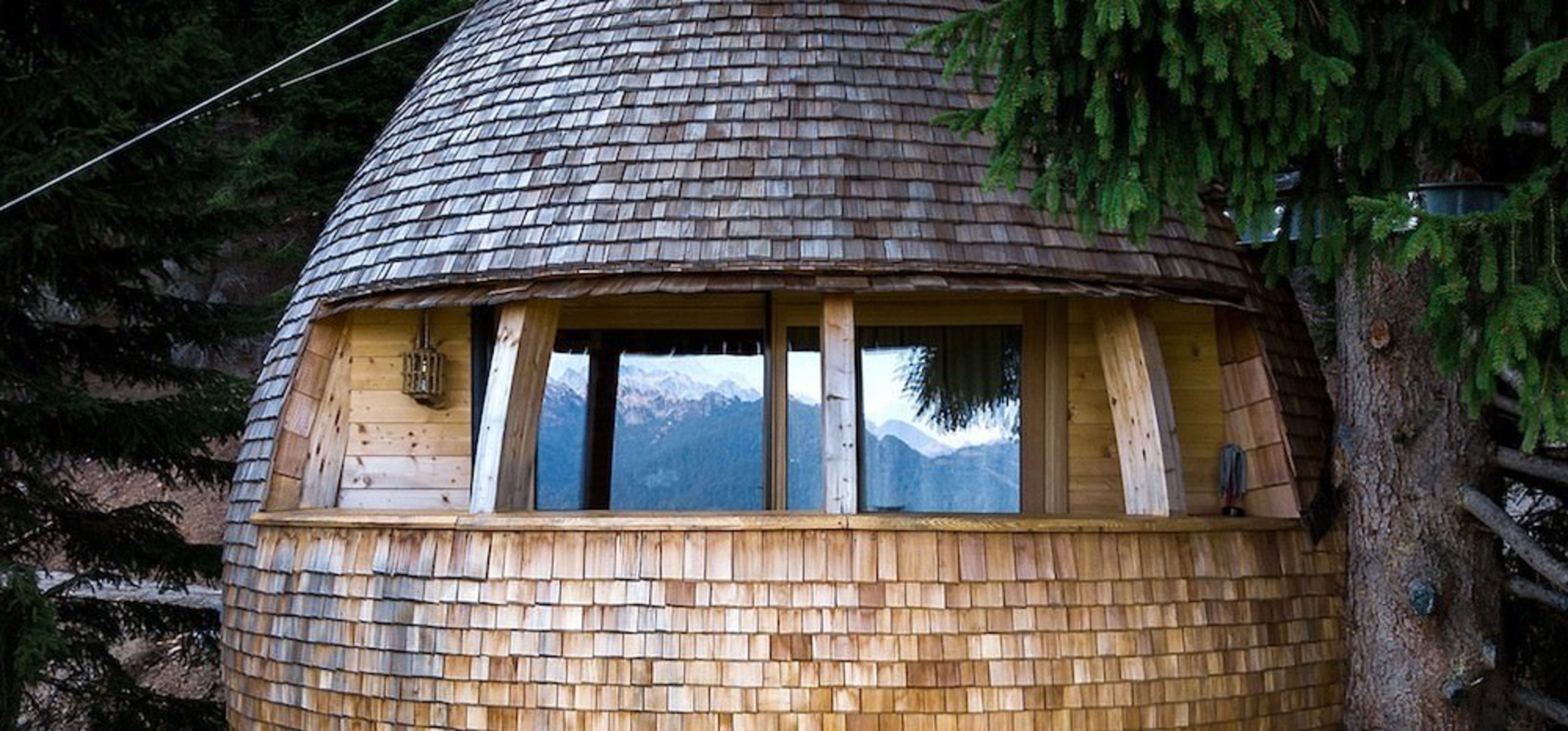 A balcony with unmatched views - A balcony cottage, facade, home, house, hut, log cabin, shack, shed, tree, window, wood, black